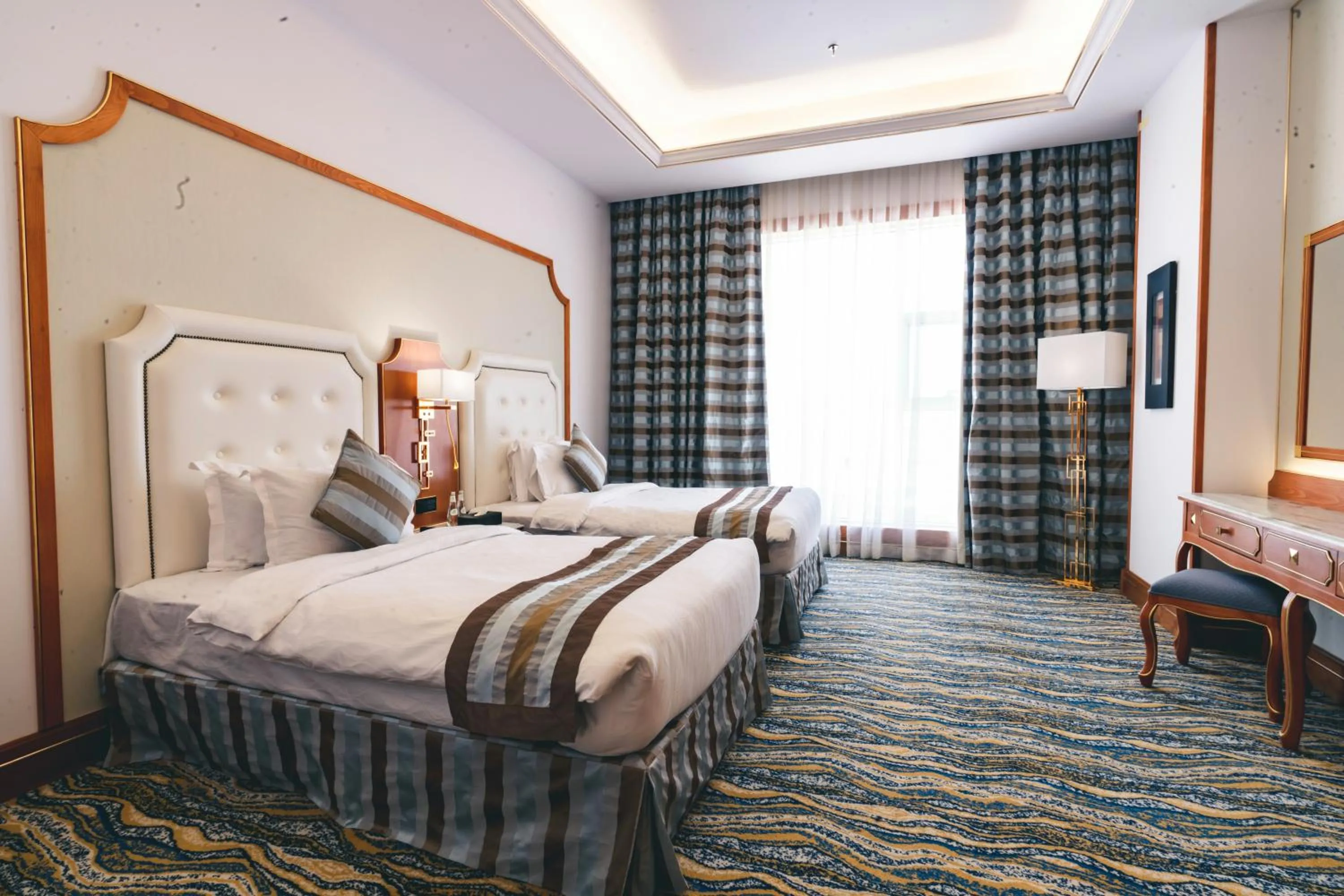 Bed in Iridium Hotel