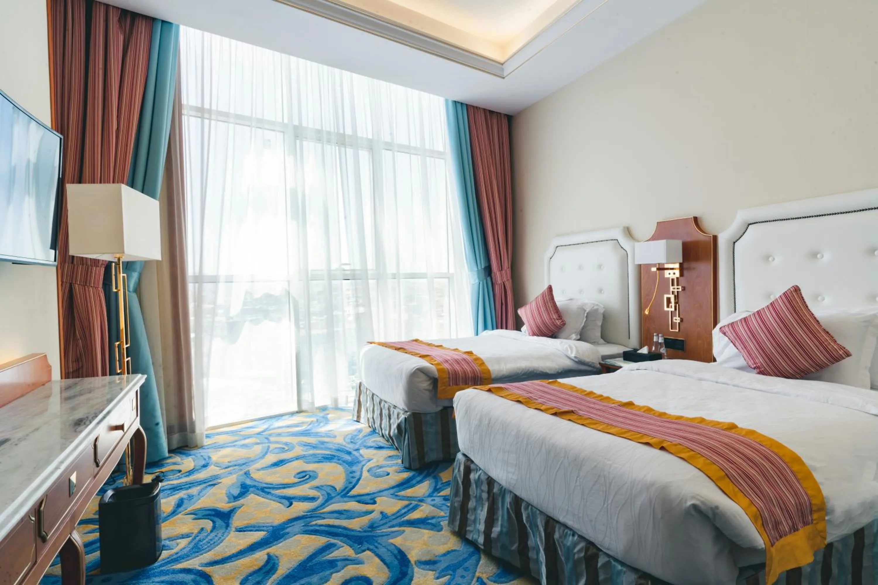 Bed in Iridium Hotel