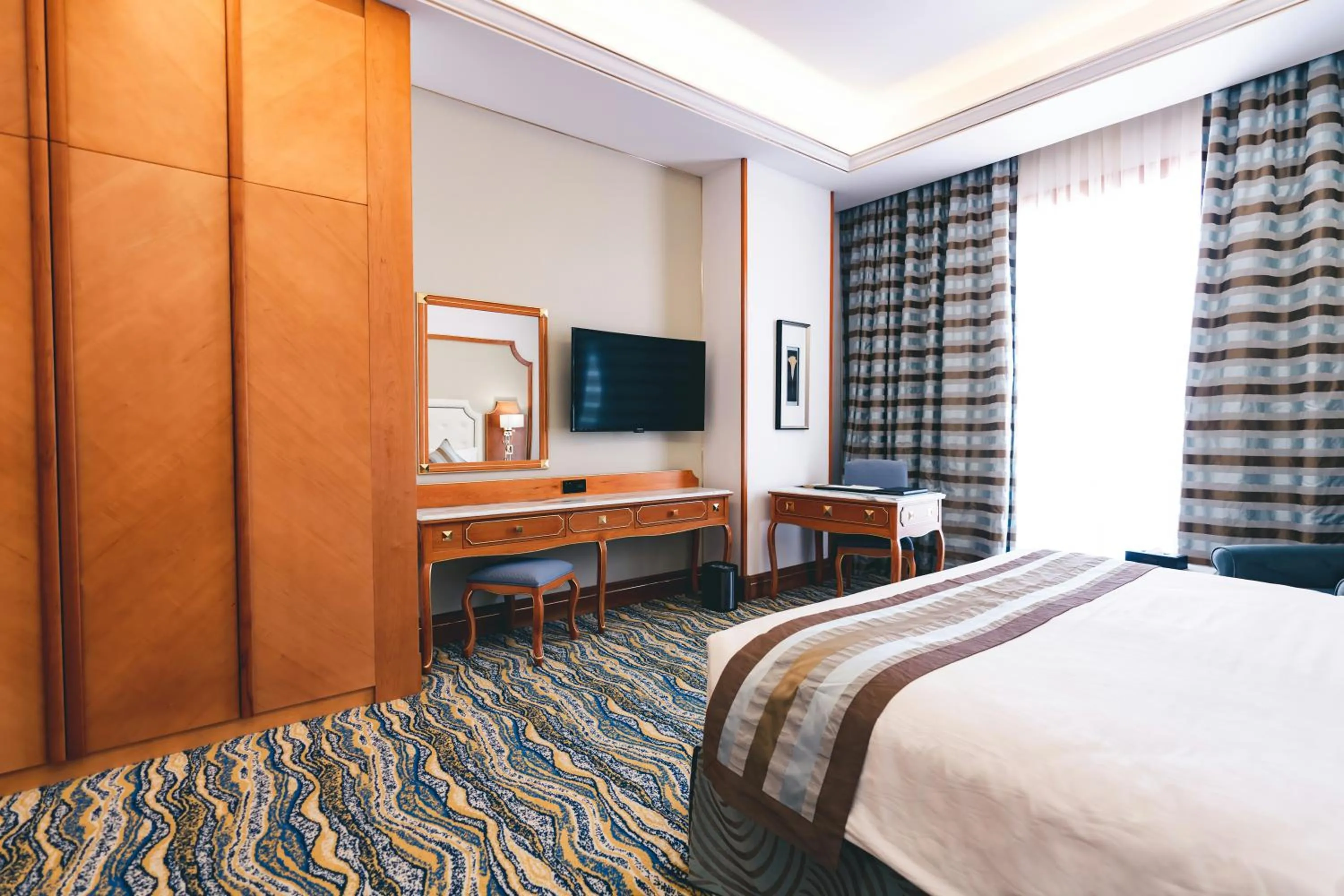 Bed in Iridium Hotel