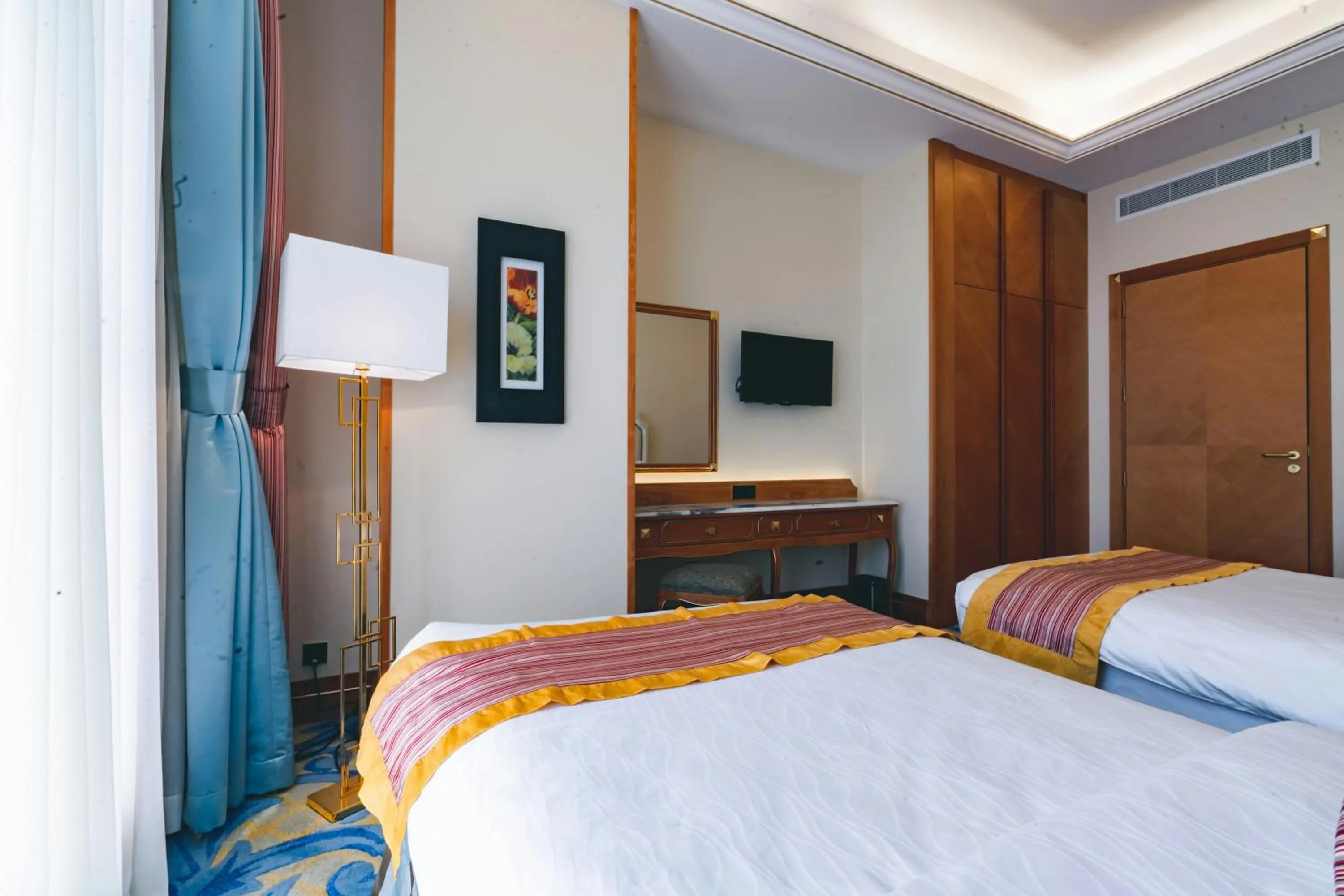 Bed in Iridium Hotel