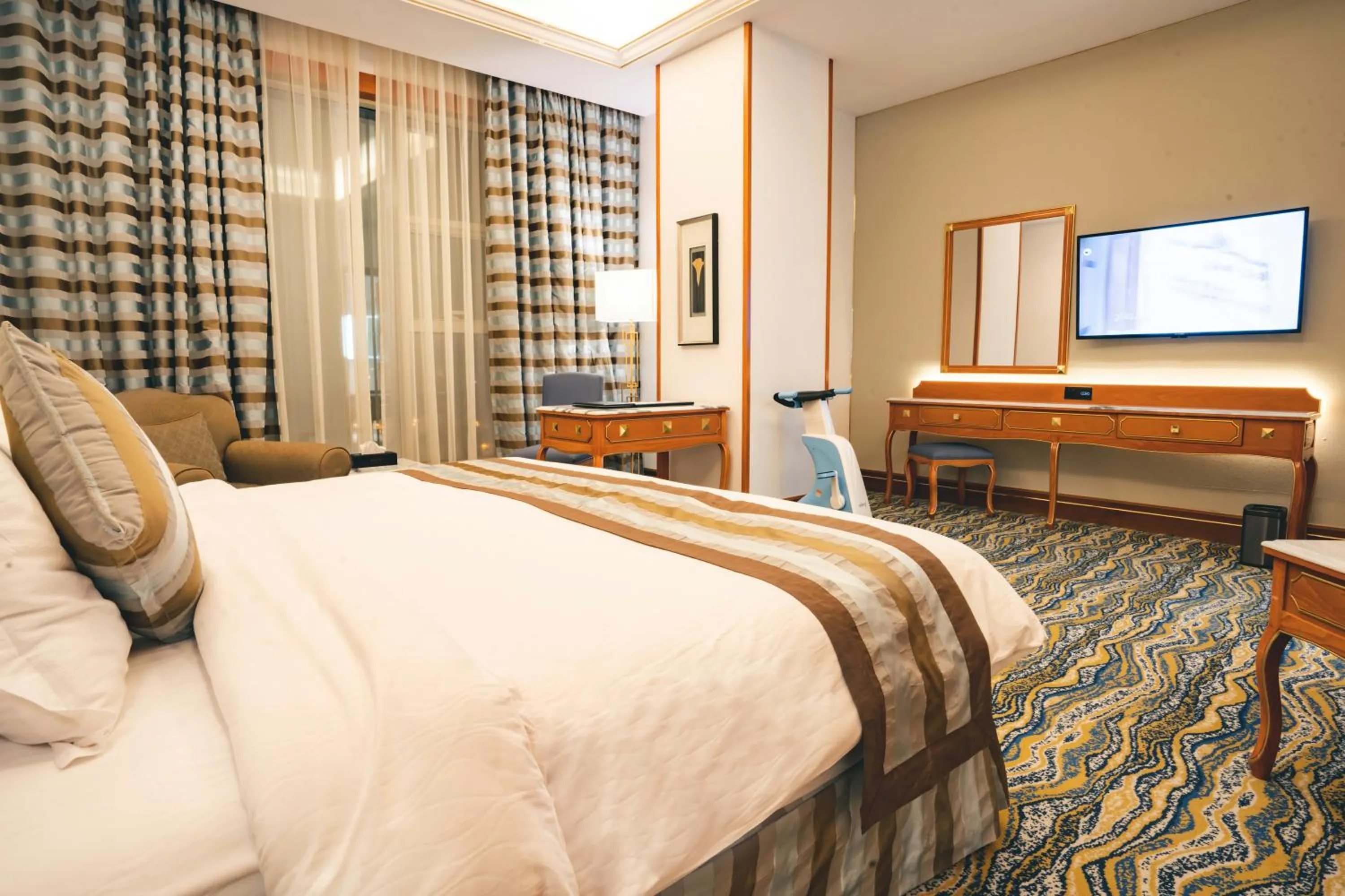 Bed in Iridium Hotel