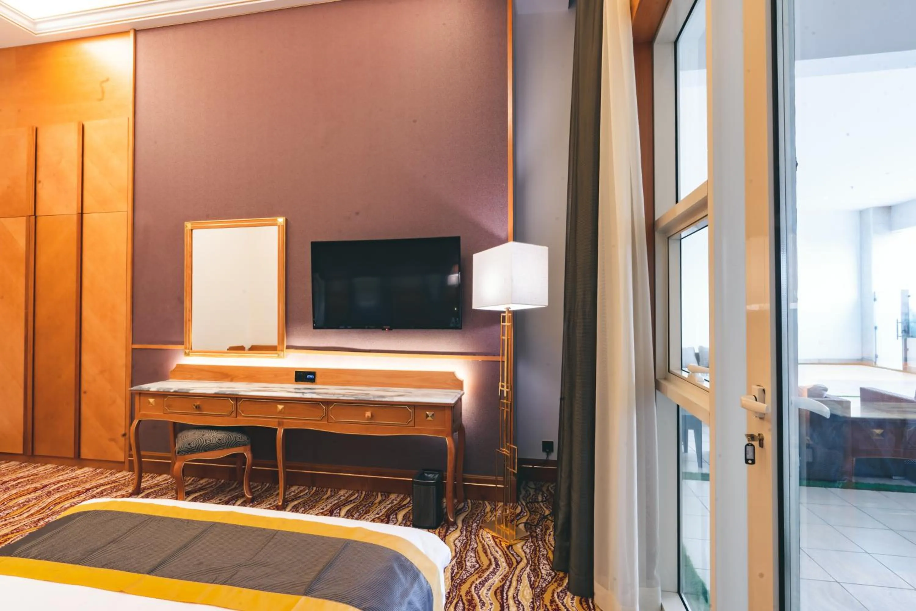 Bed in Iridium Hotel