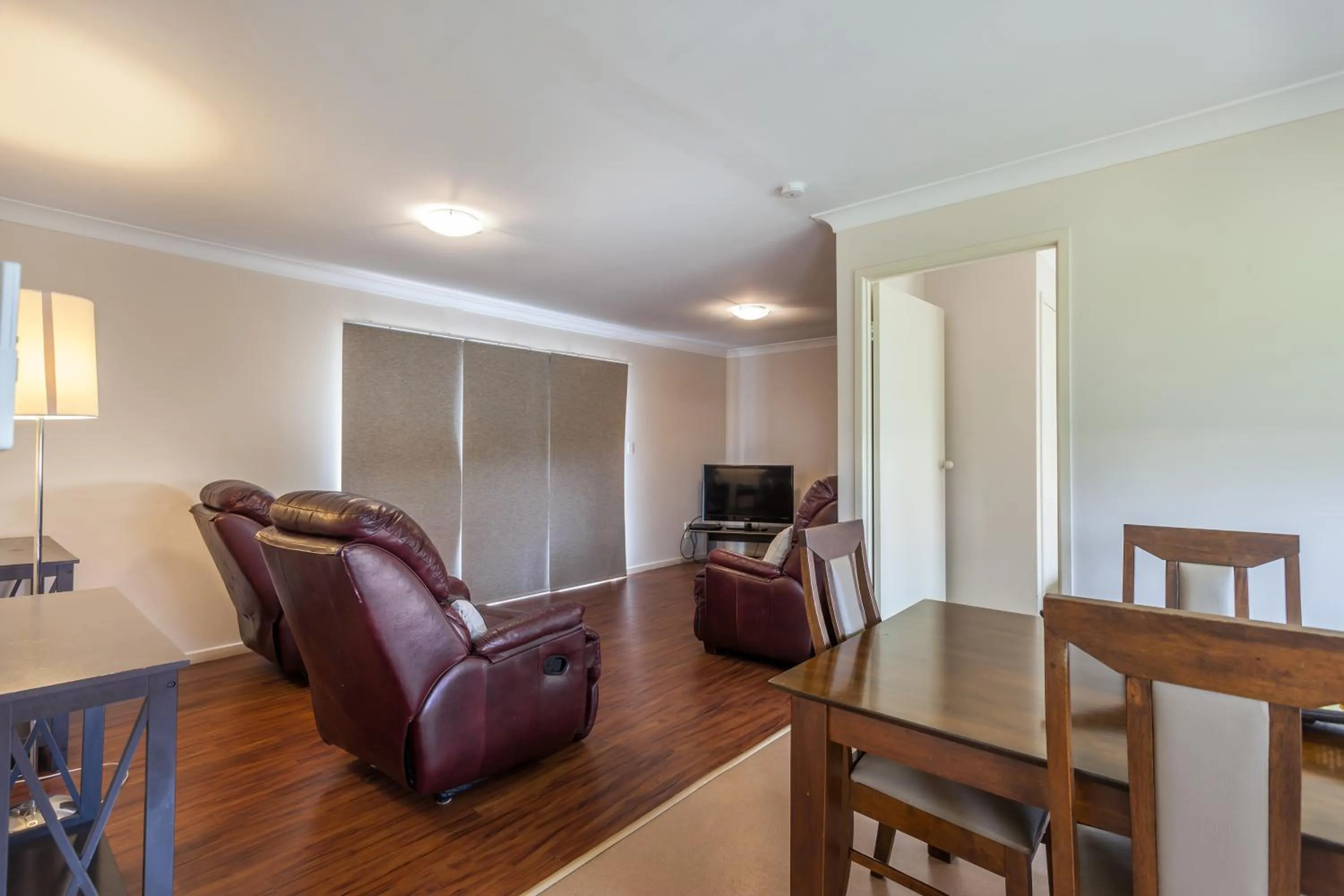 Living room in Clifford Gardens Motor Inn