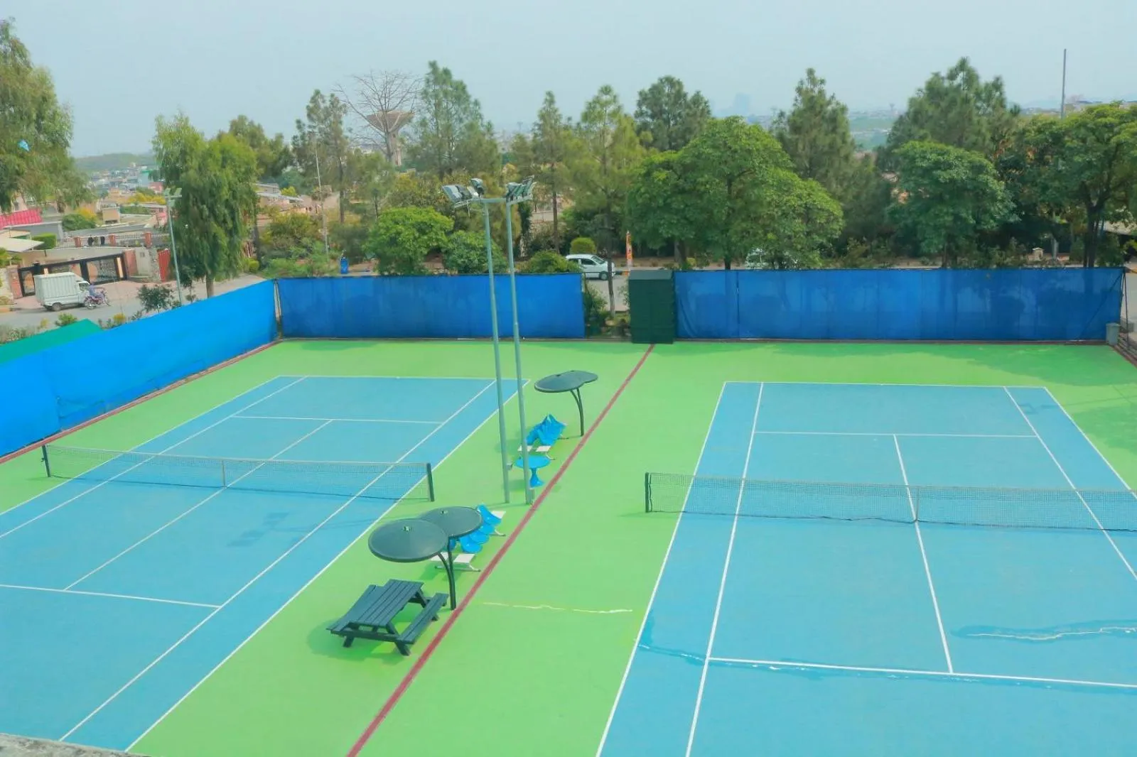 Tennis court in Safari Club 1