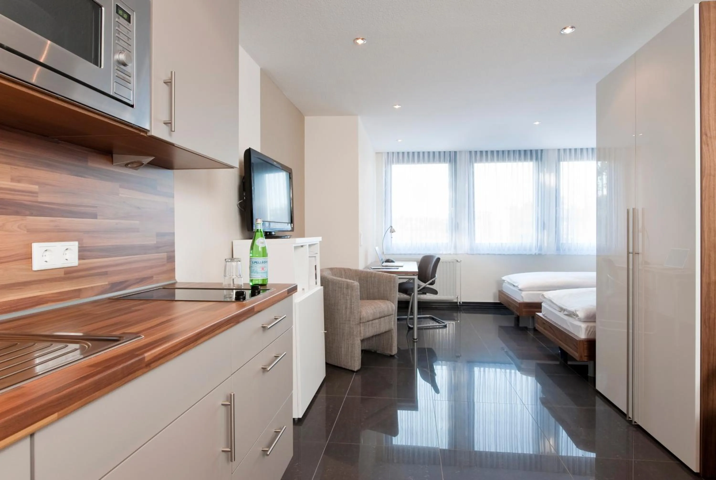 Kitchen or kitchenette, Bed in Appartements am Kleeblatt