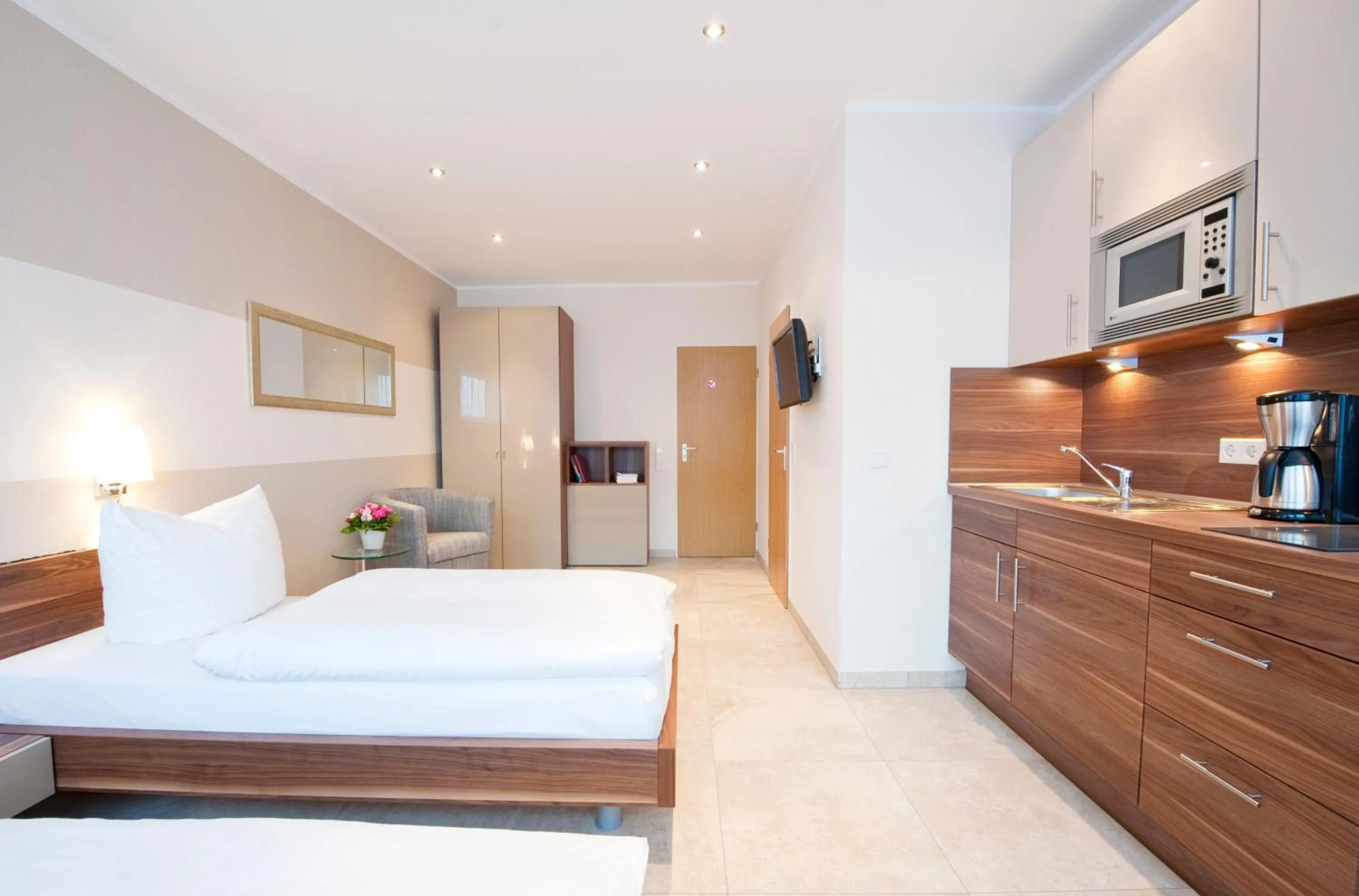 Kitchen or kitchenette, Bed in Appartements am Kleeblatt