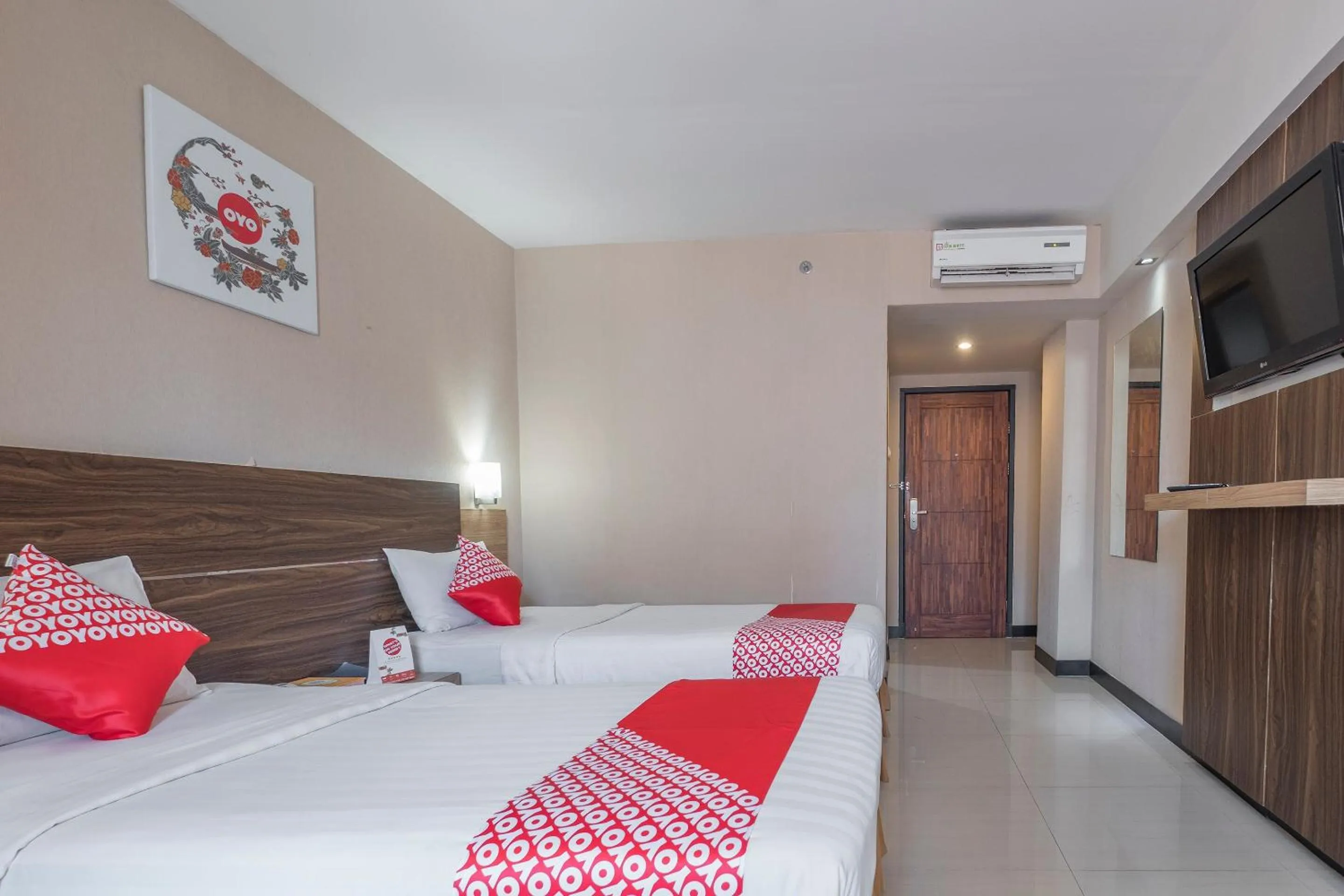 Bedroom in OYO 1081 Allson City Hotel Makassar