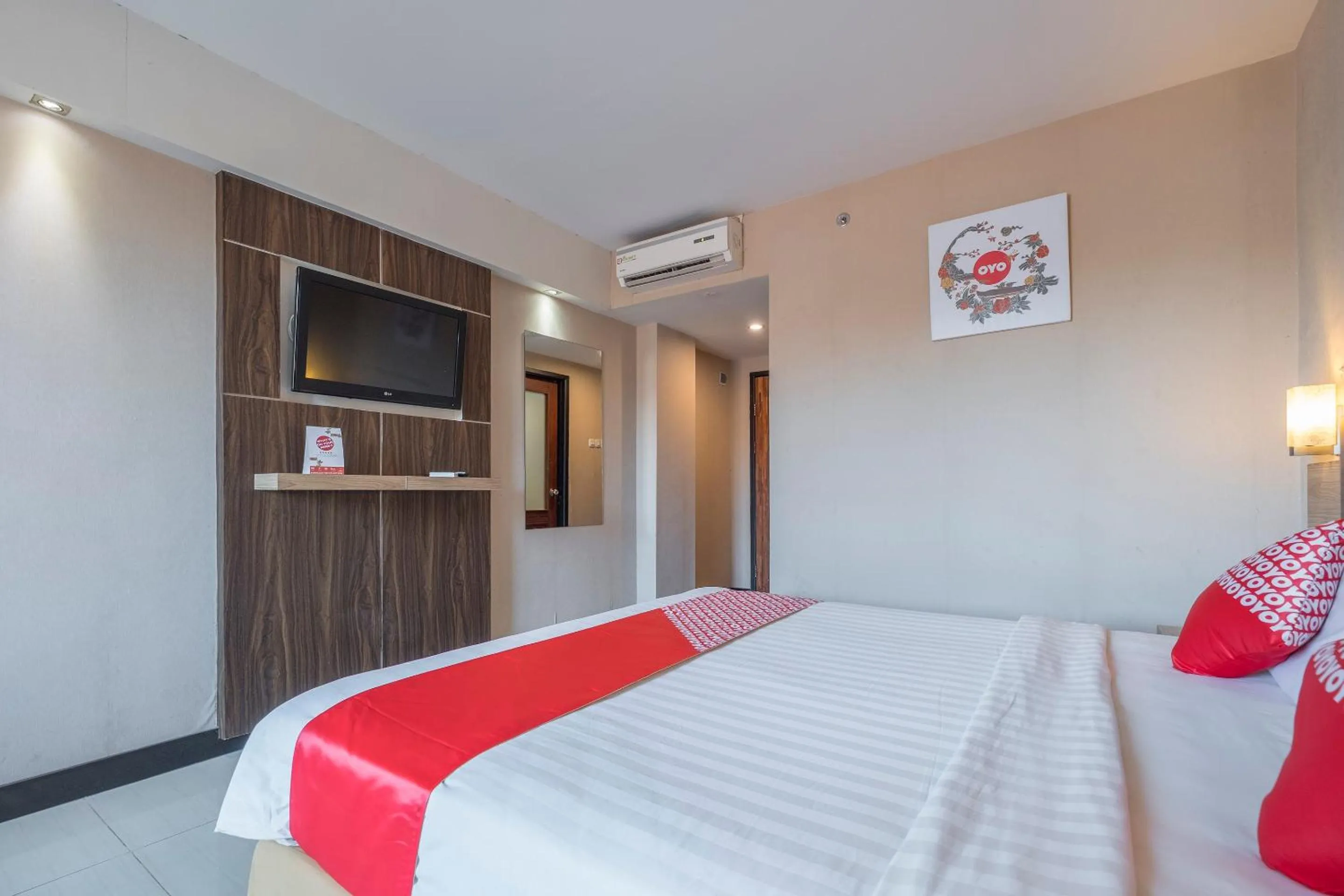 Bedroom in OYO 1081 Allson City Hotel Makassar