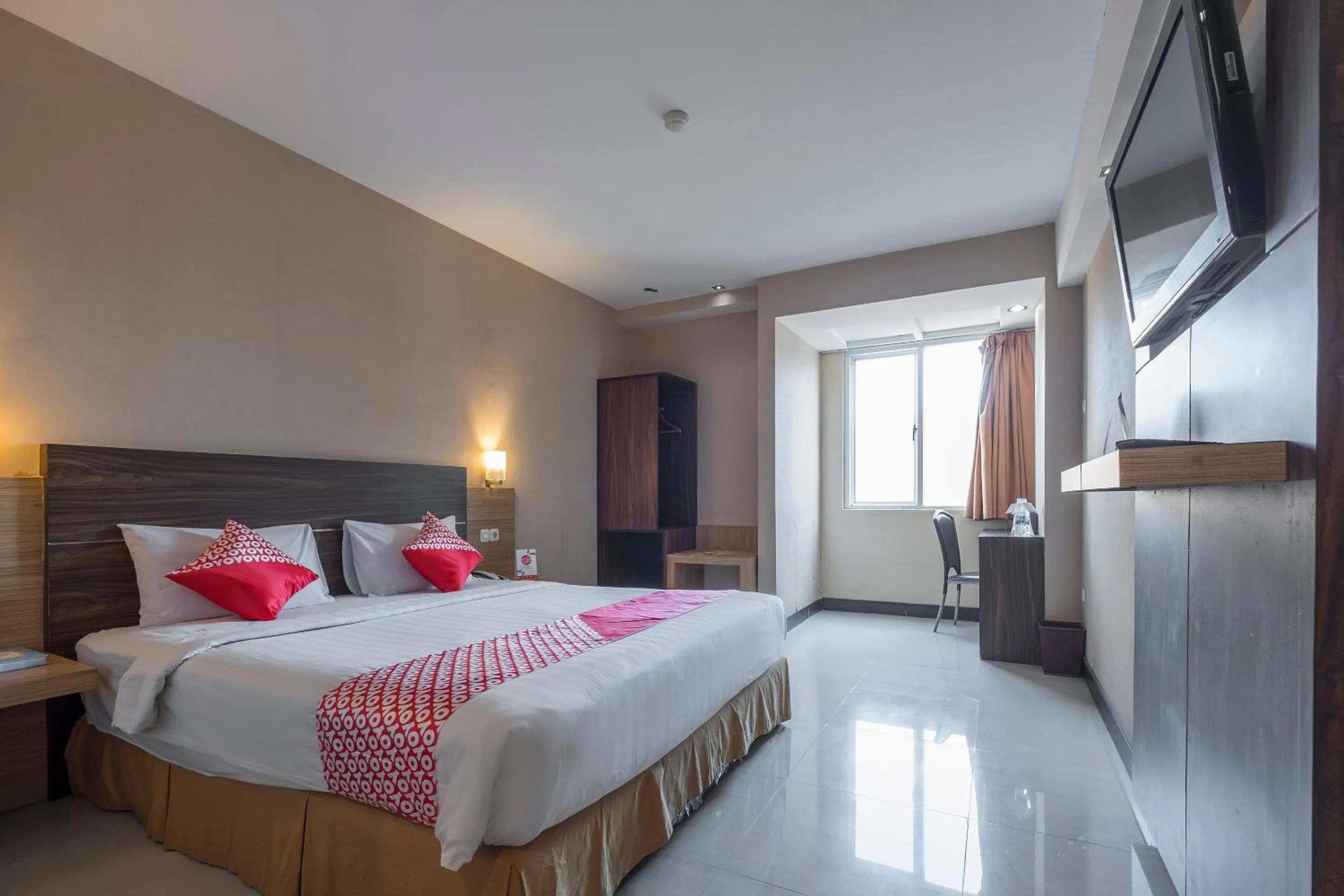 Bedroom in OYO 1081 Allson City Hotel Makassar