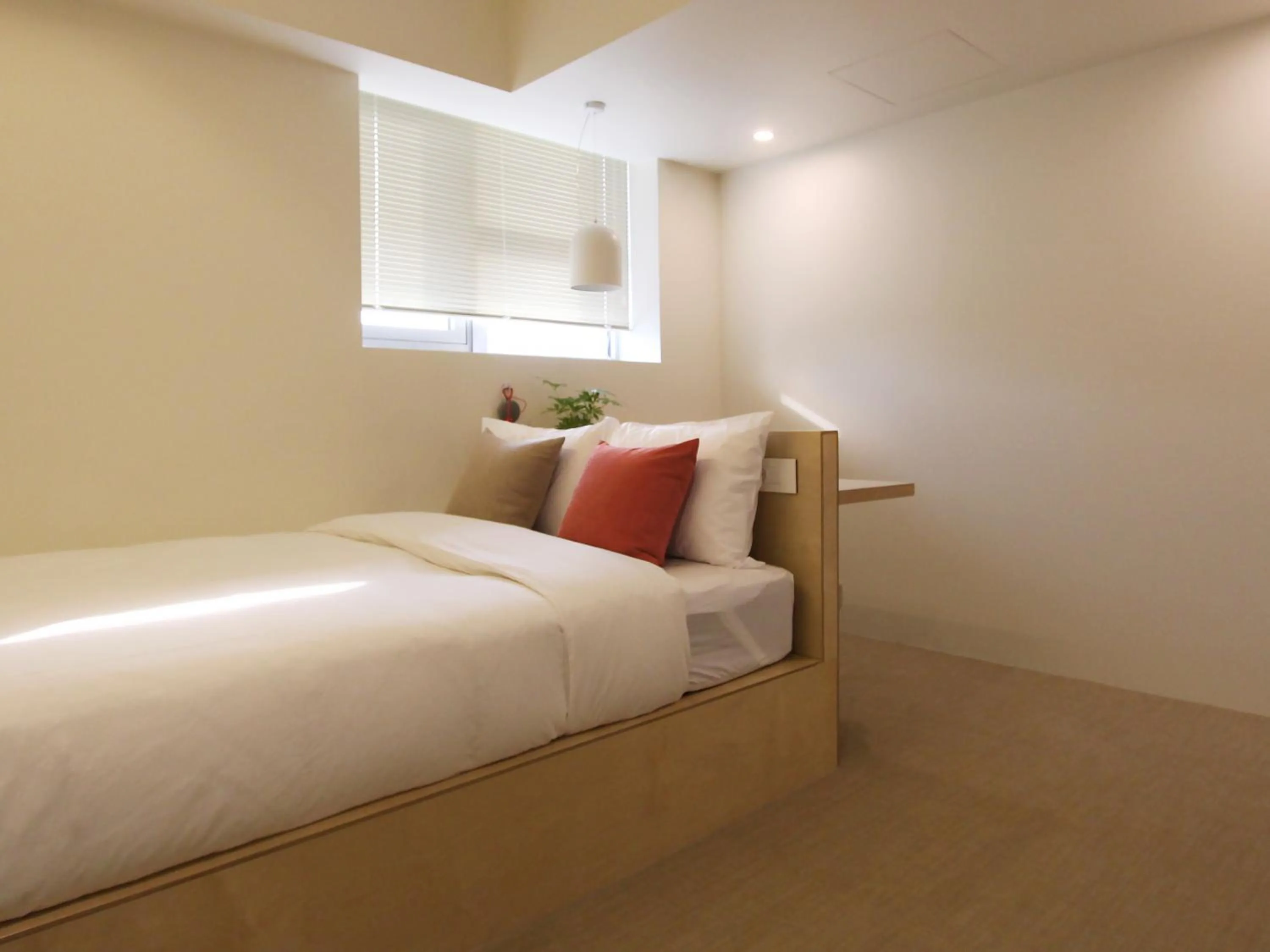 Bed in Tong Tong Petit Hotel