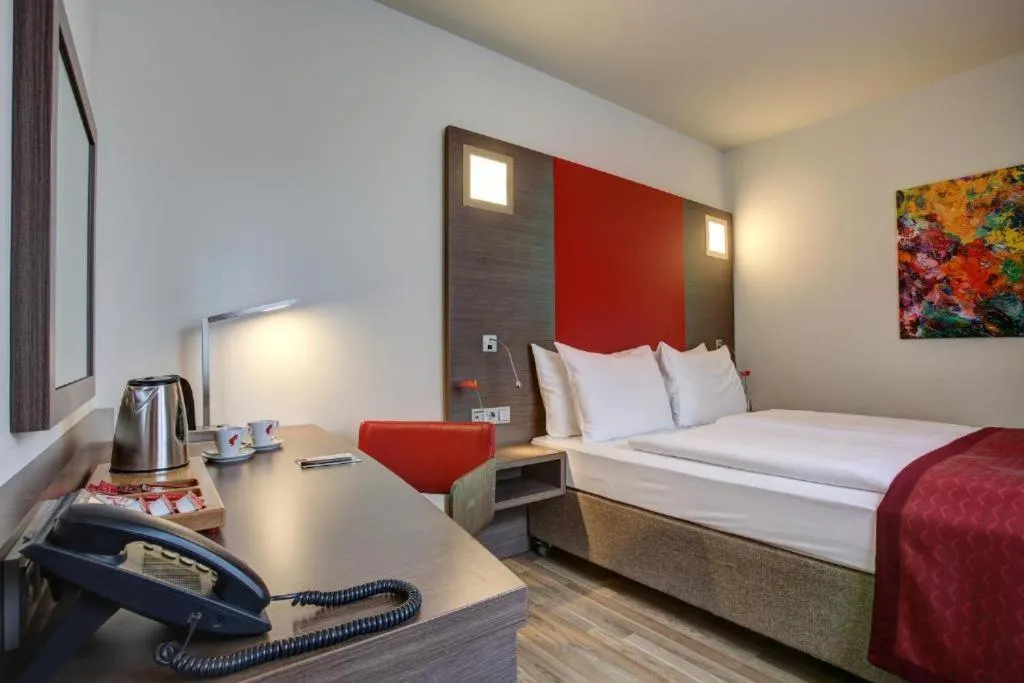 Bed in Hotel Orangerie