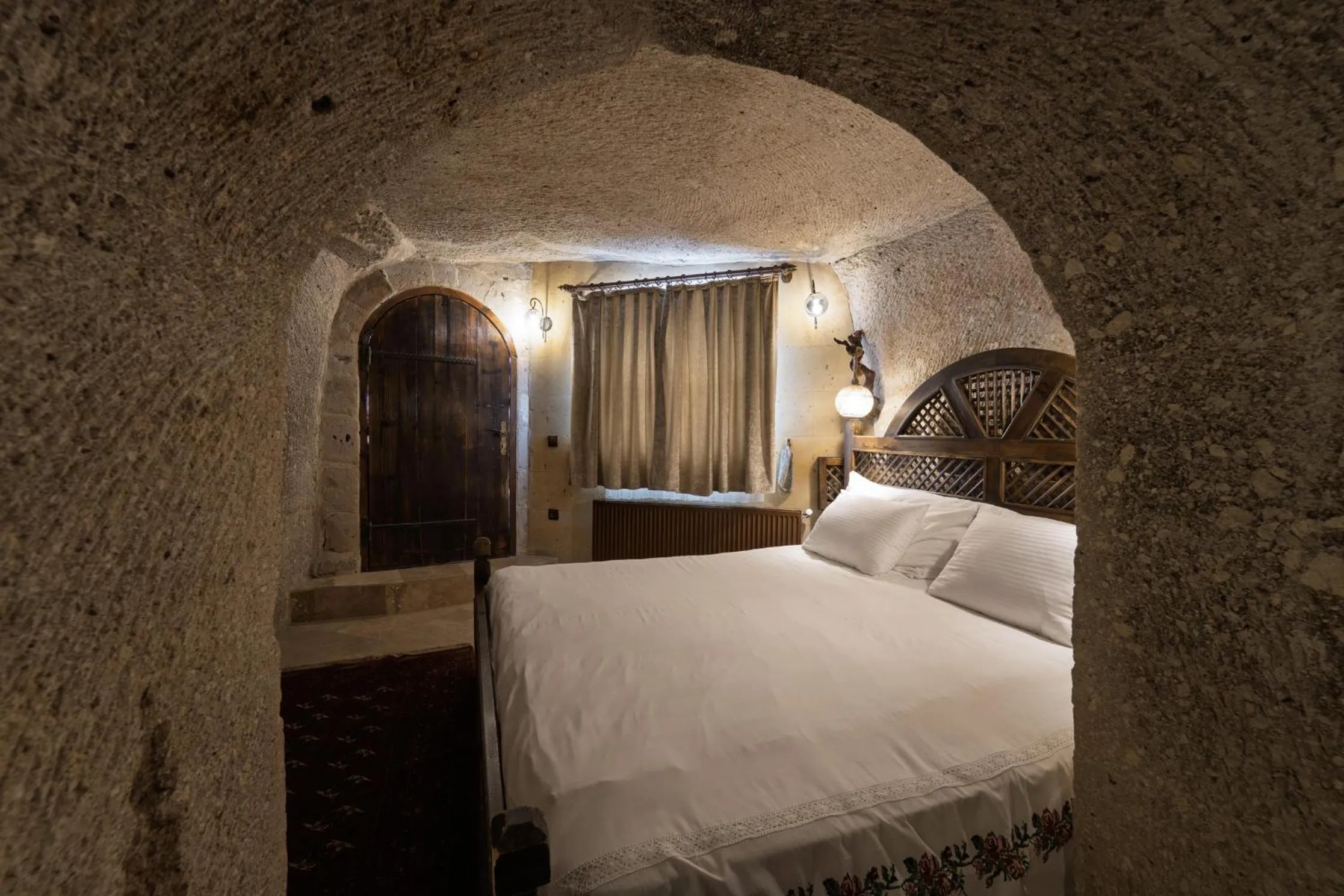 Bed in Grand Cave Suites