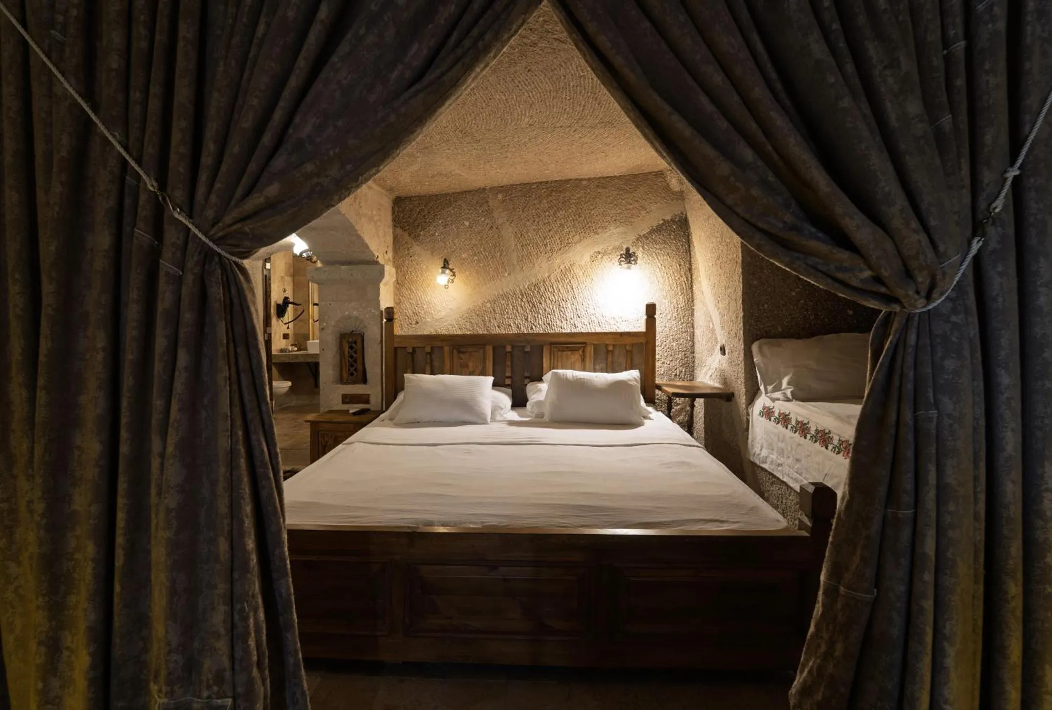 Bed in Grand Cave Suites