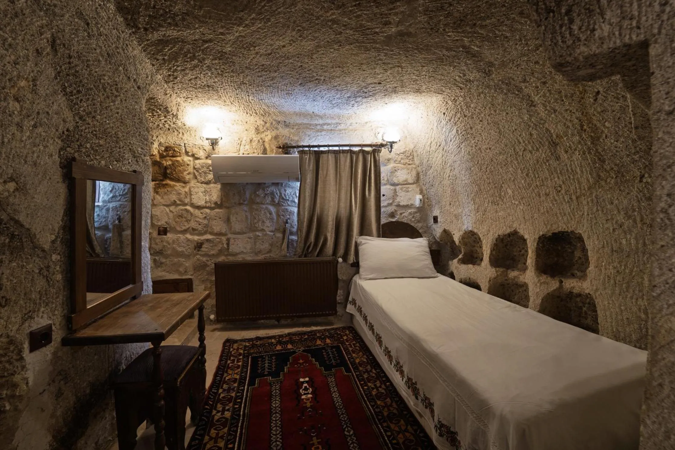 Bed in Grand Cave Suites
