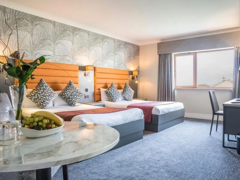 Living room, Bed in Diamond Coast Hotel