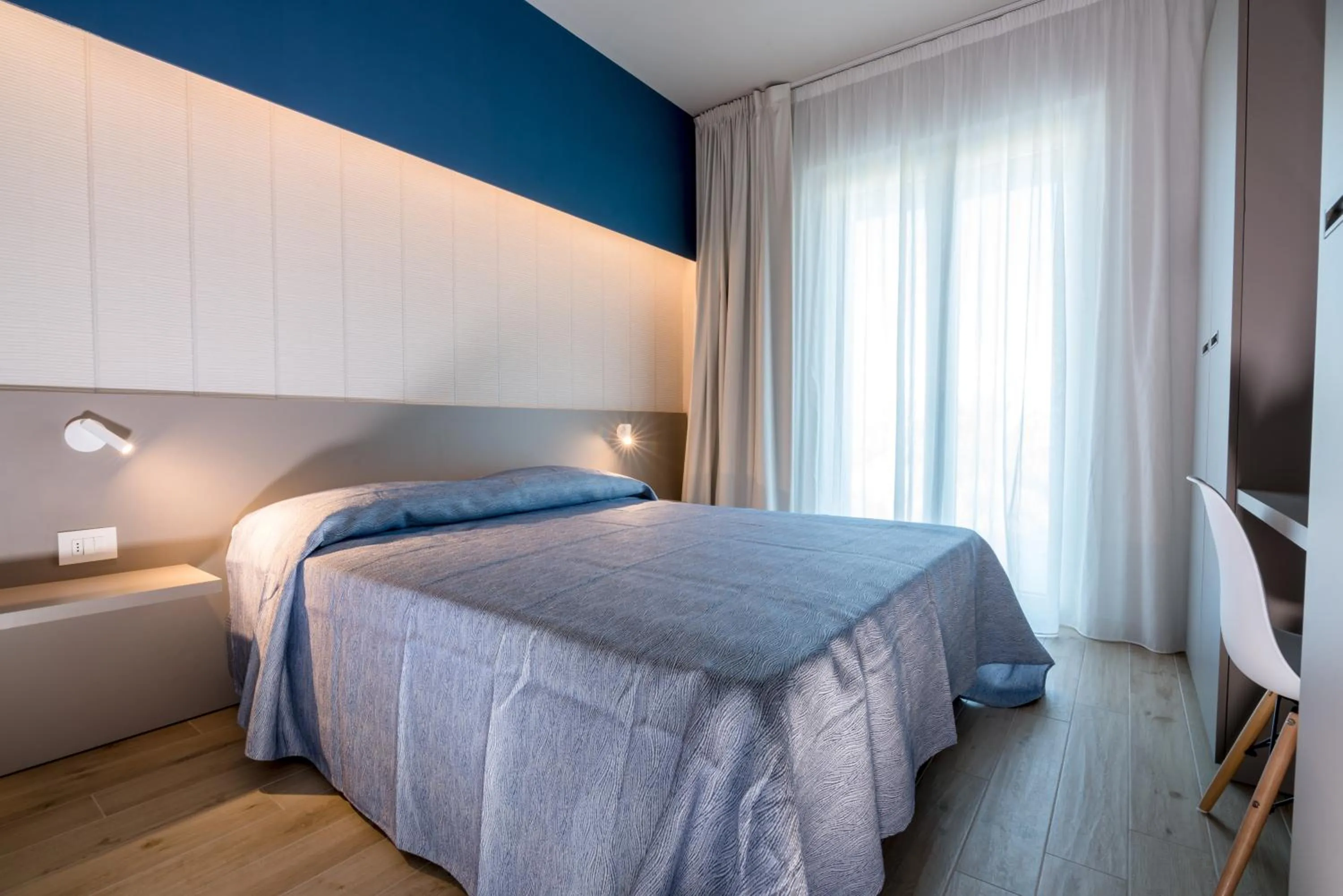 Bed in Family Hotel Relax