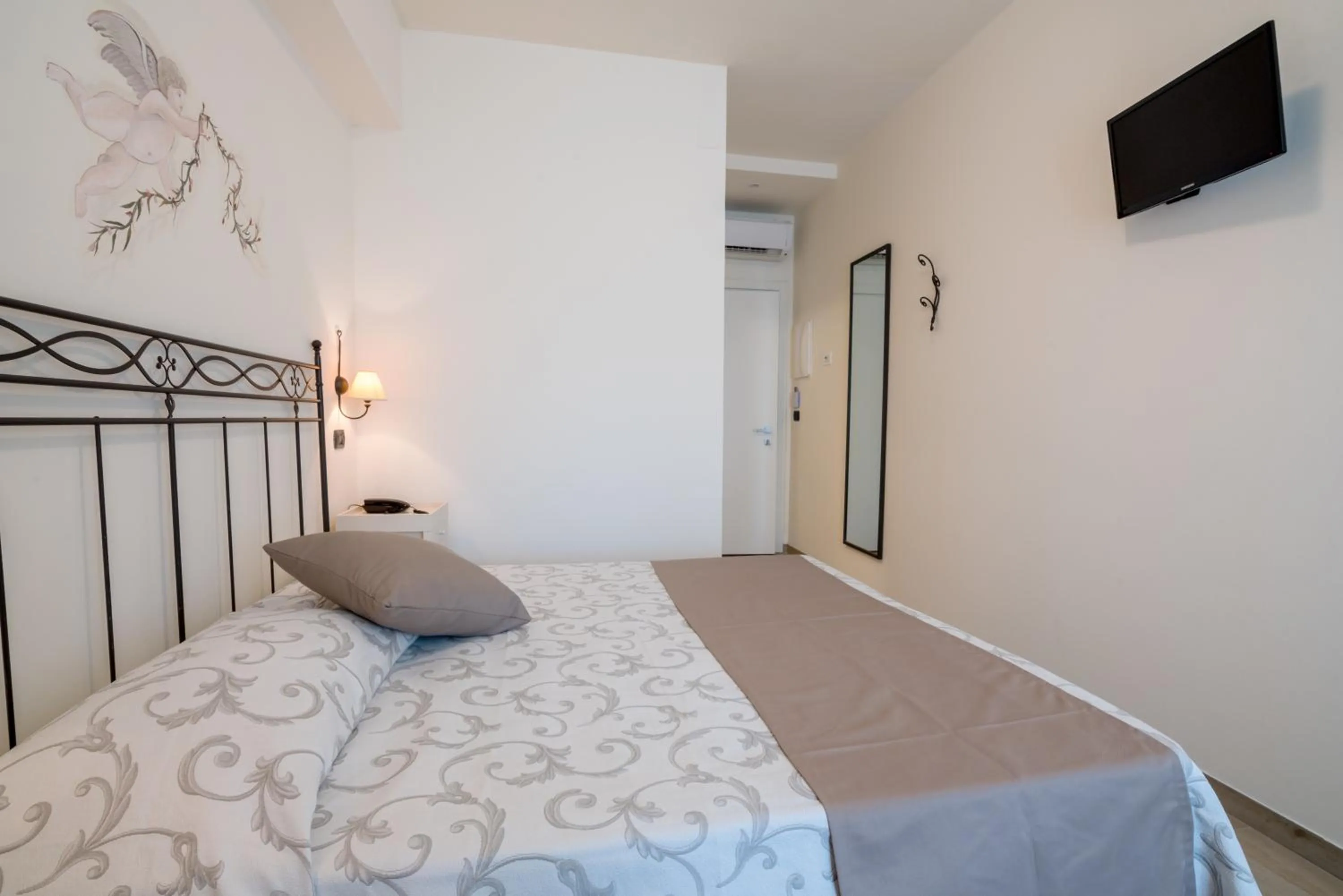 Bed in Family Hotel Relax