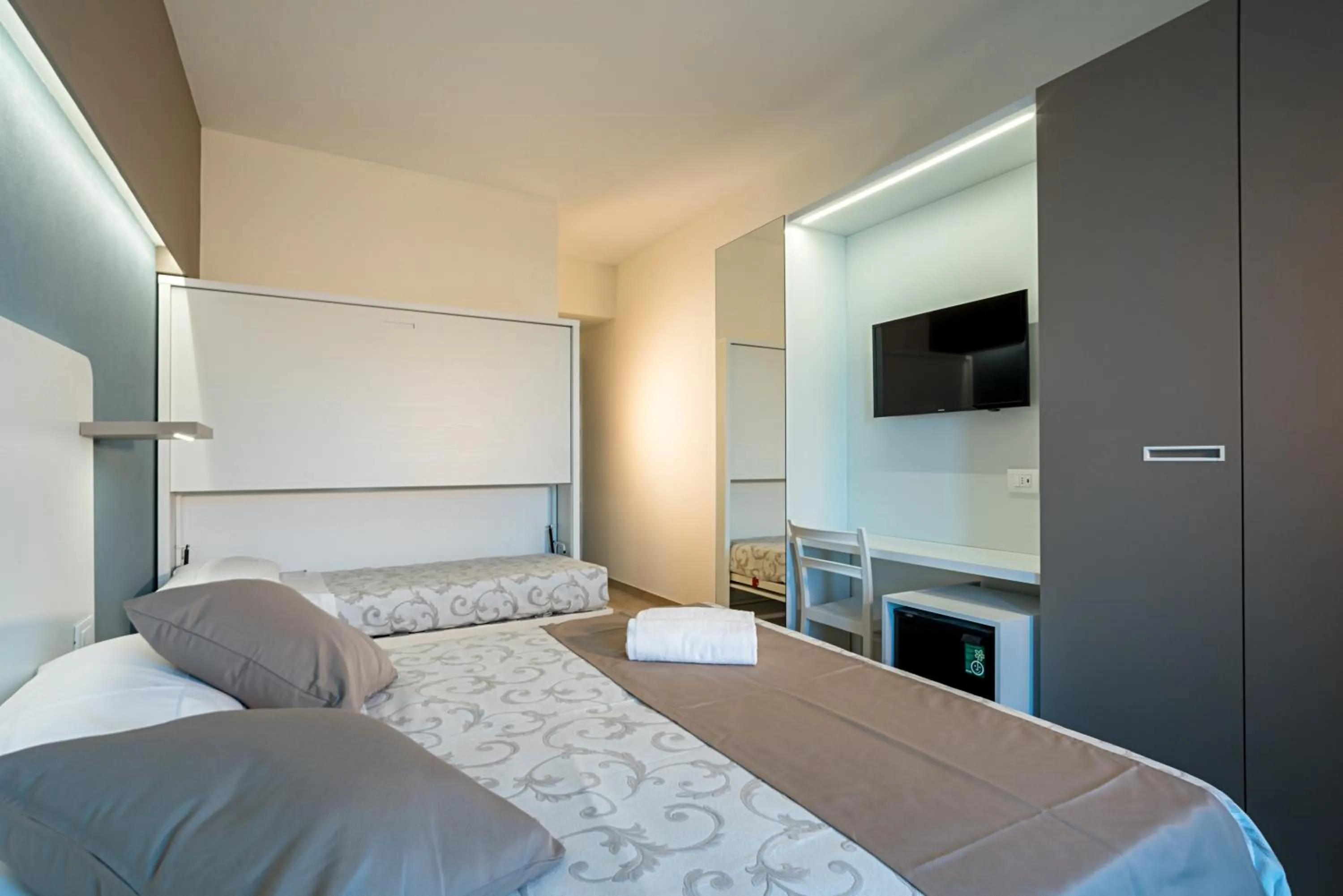 Bed in Family Hotel Relax