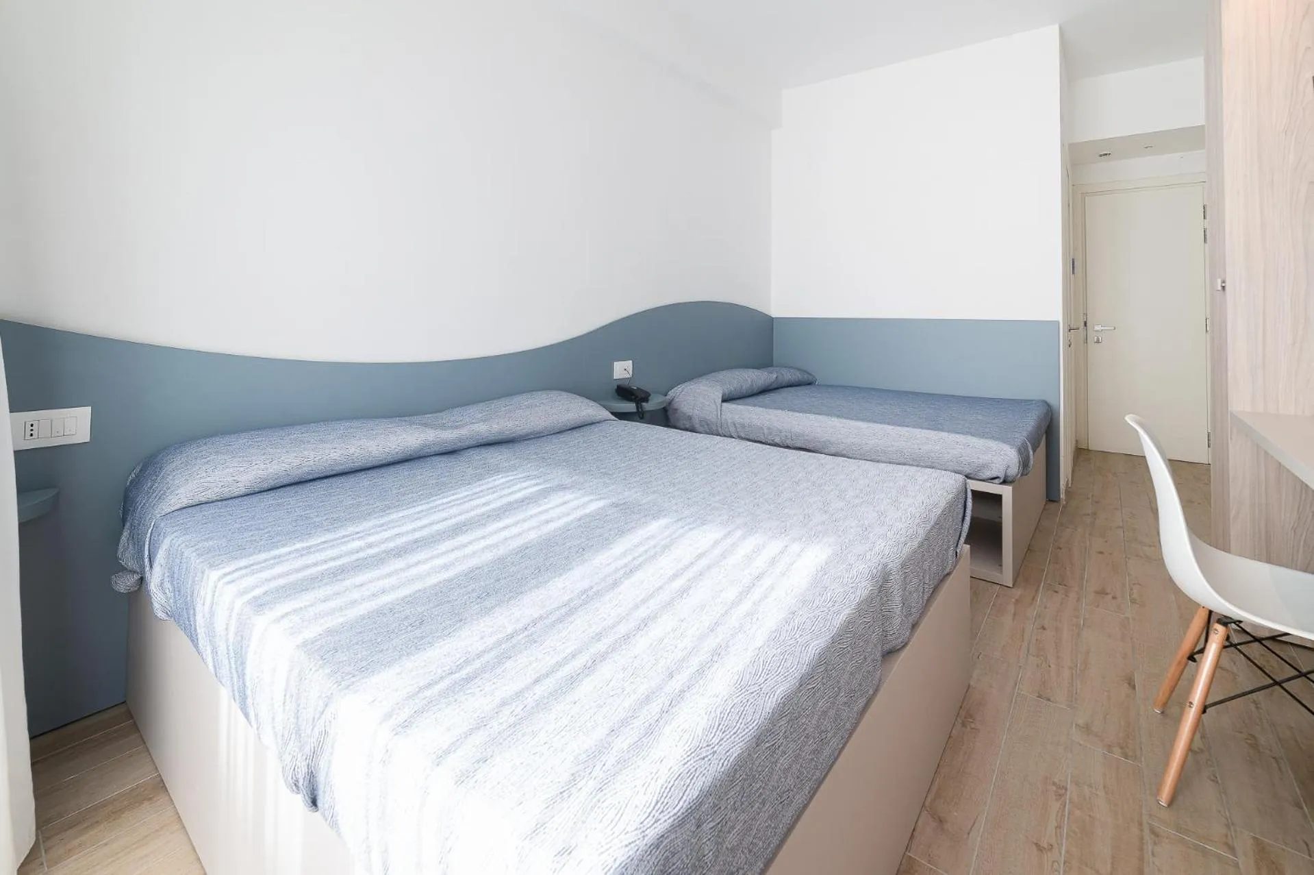 Bed in Family Hotel Relax