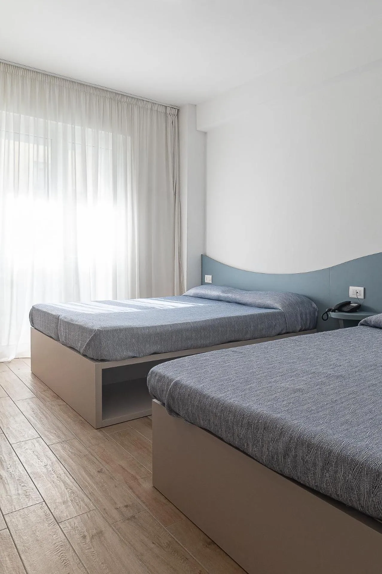 Bed in Family Hotel Relax