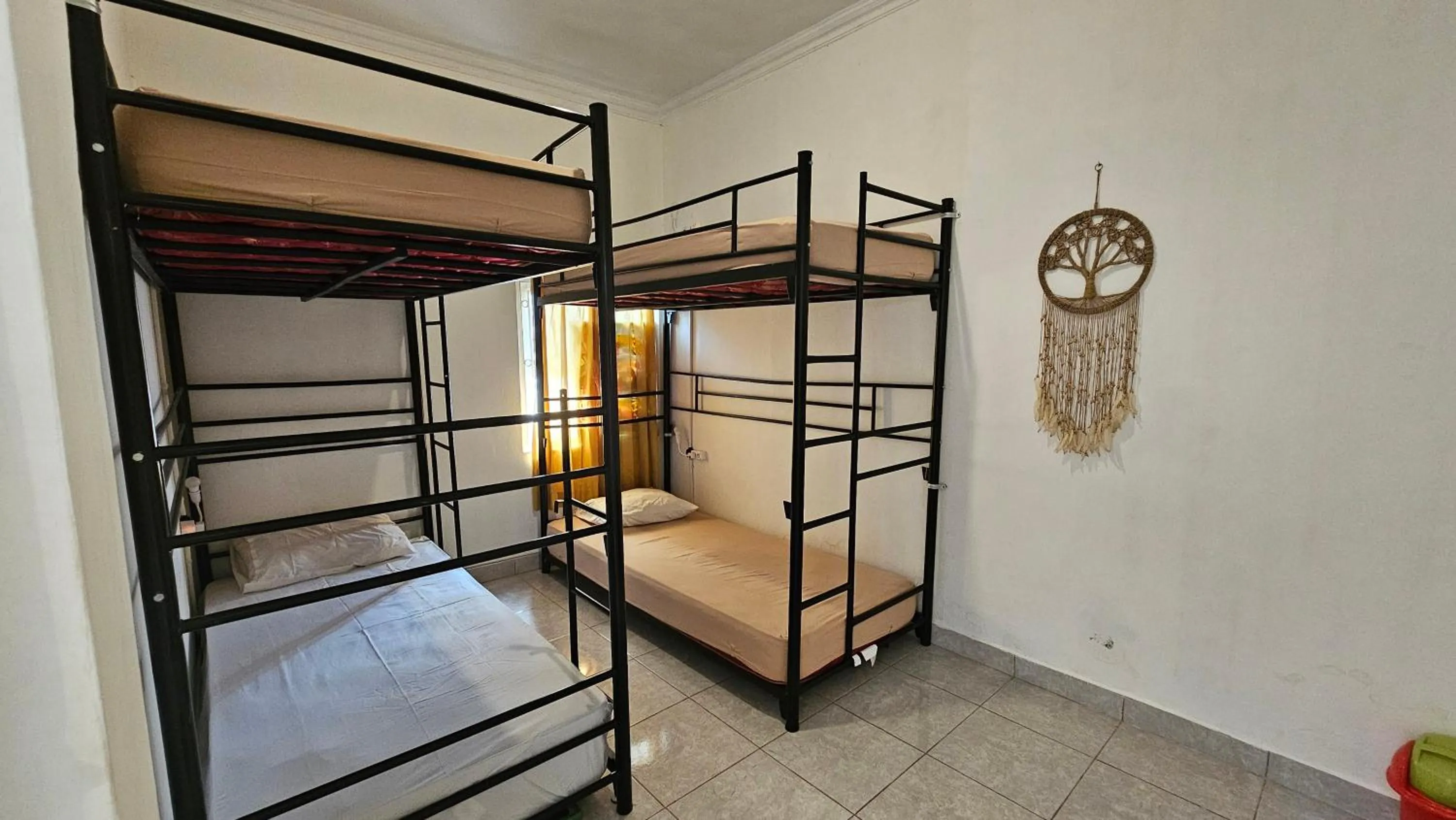 bunk bed, Bed in Oke Baik Hostel