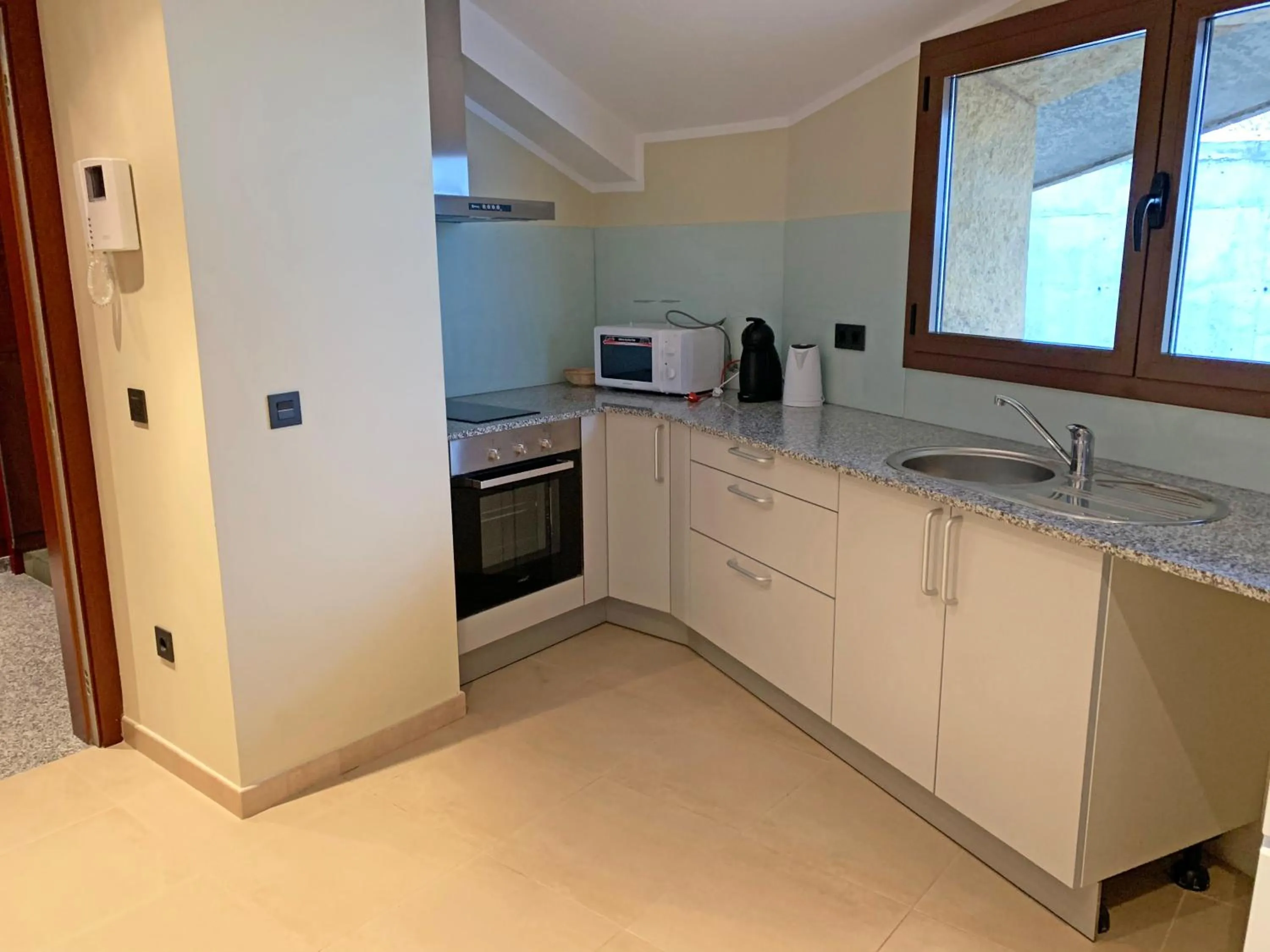 Kitchen or kitchenette in Apartamentos Llorts Ordino 3000