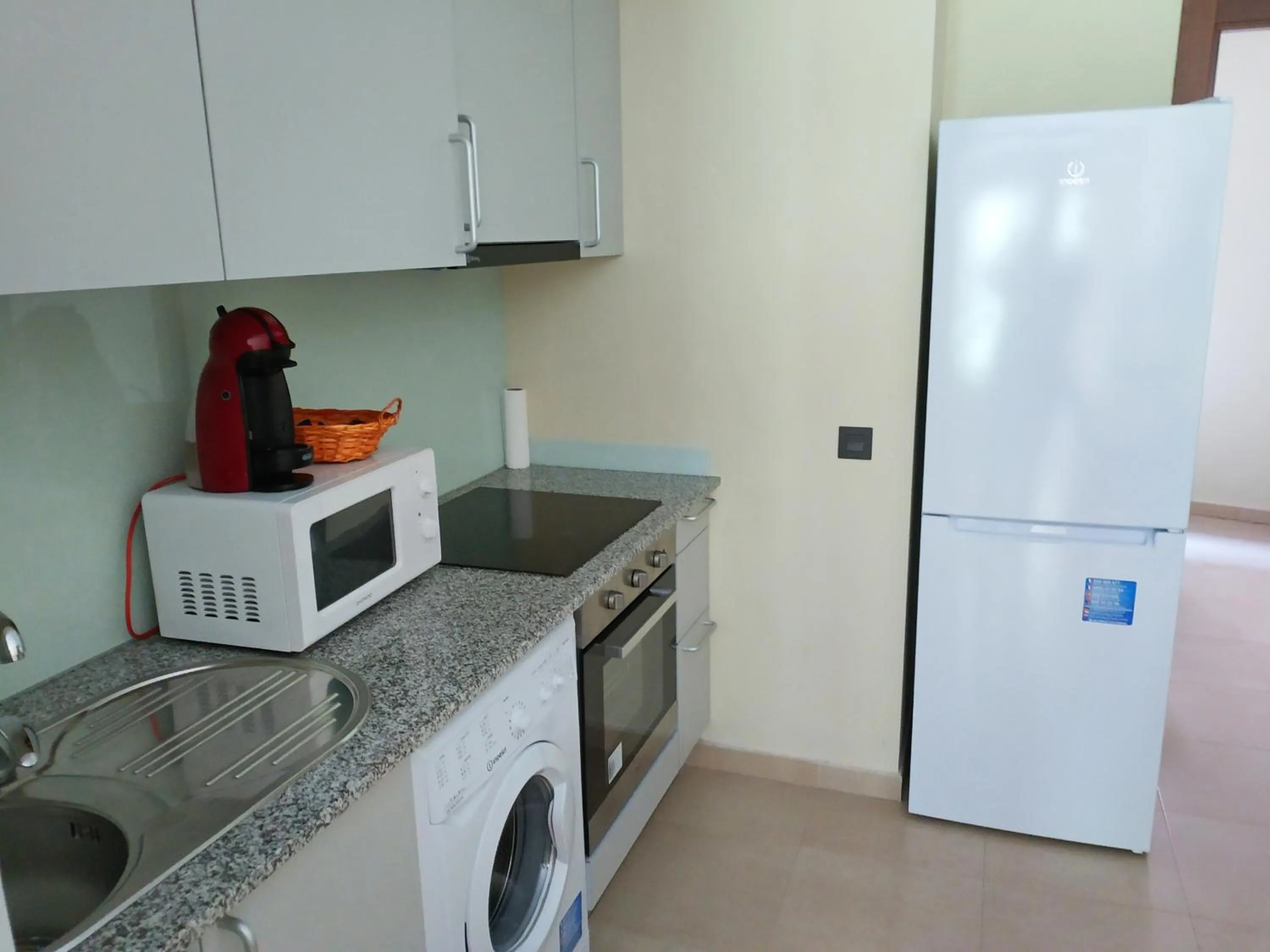 Kitchen or kitchenette in Apartamentos Llorts Ordino 3000