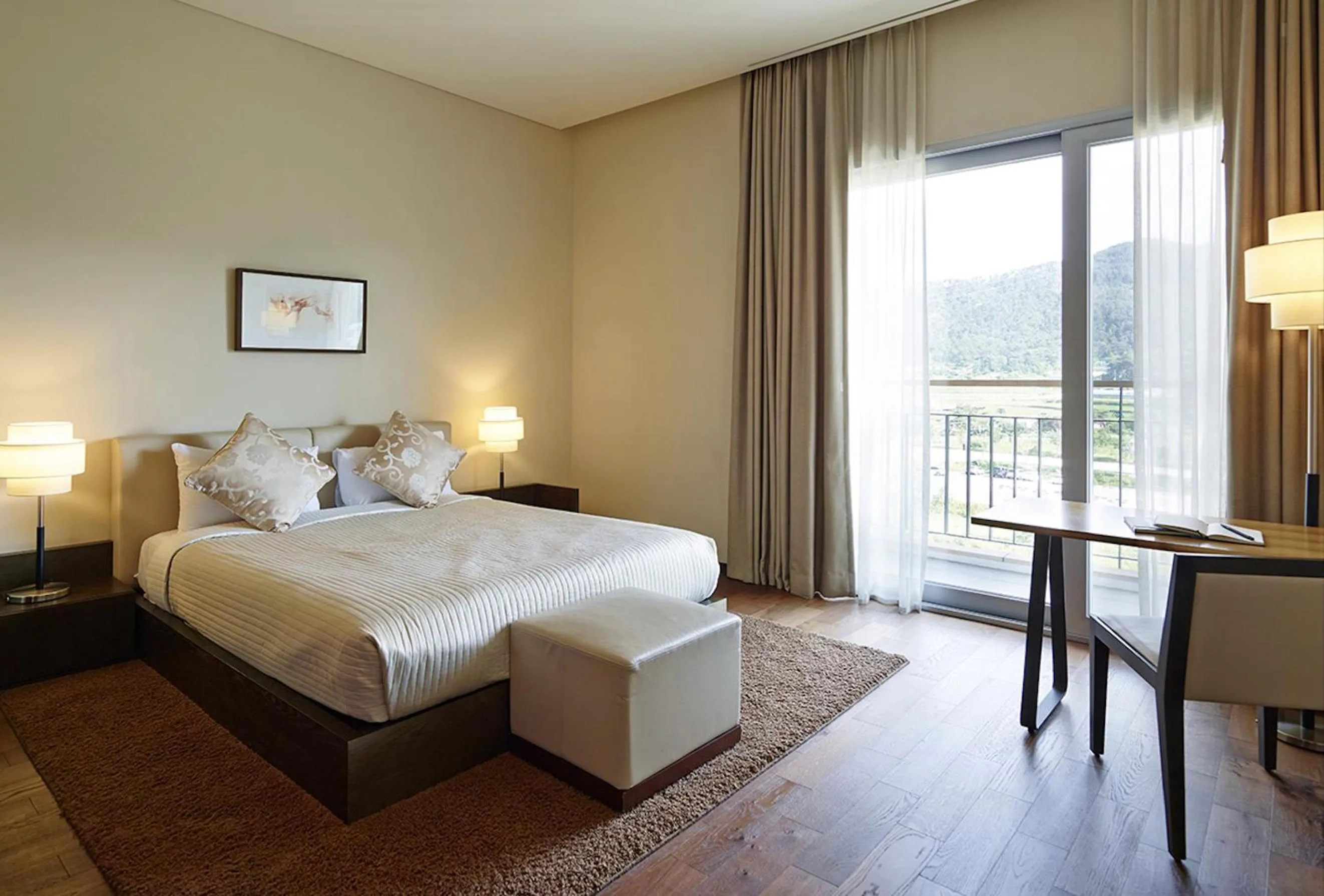 Bed in The Suites Hotel Namwon