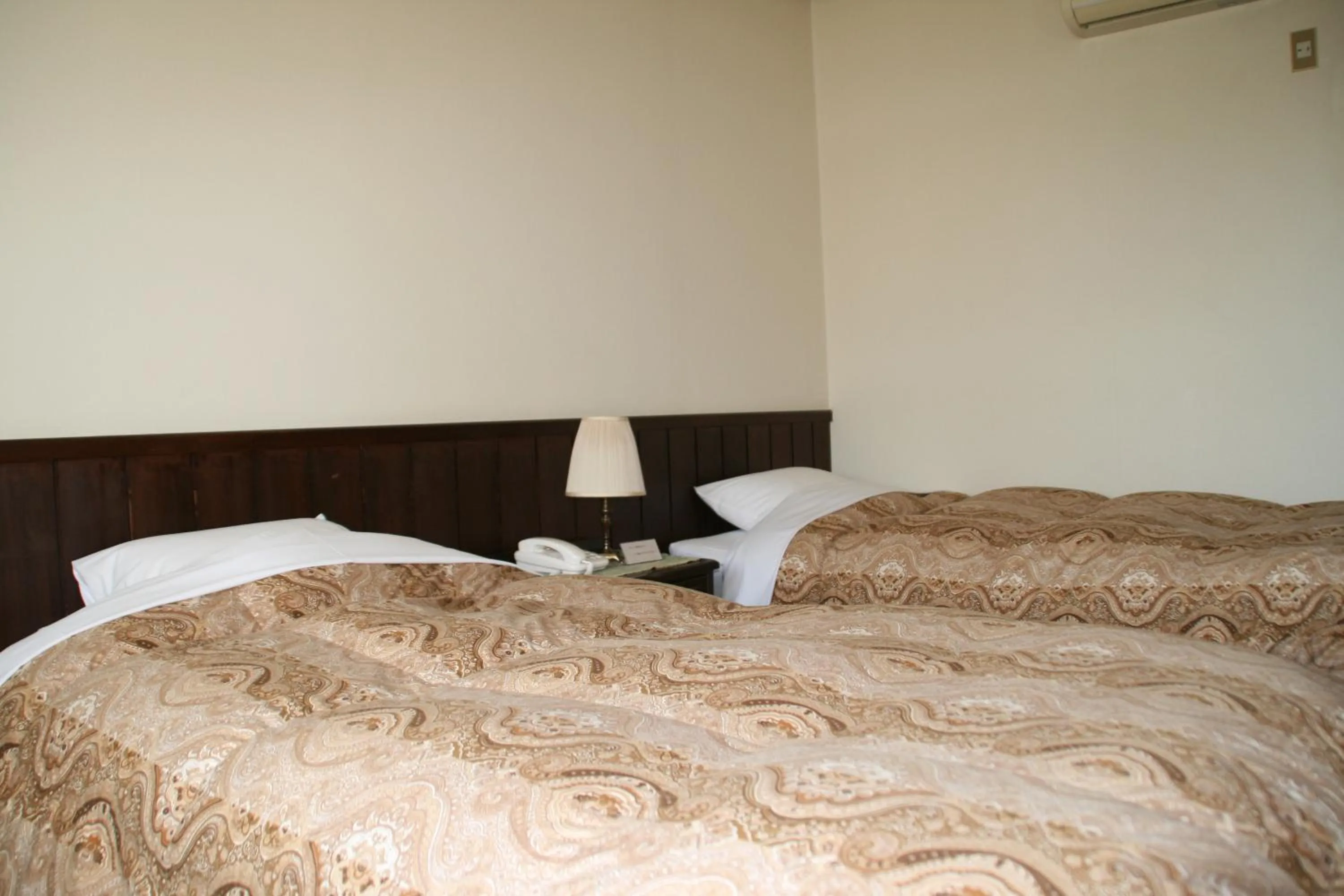 Bed in Pension Totem Pole