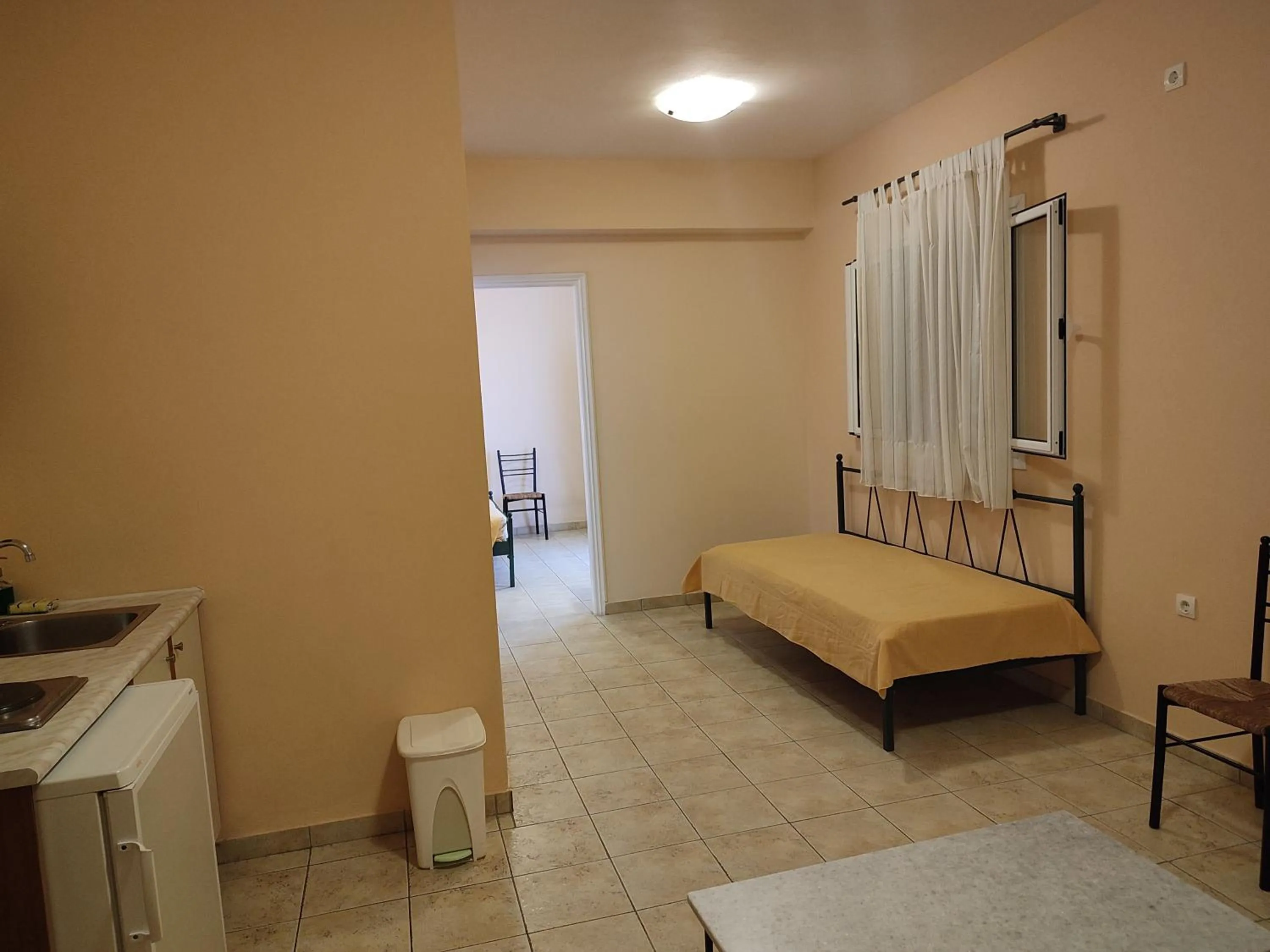 Bed in Elanthi Village Apartments