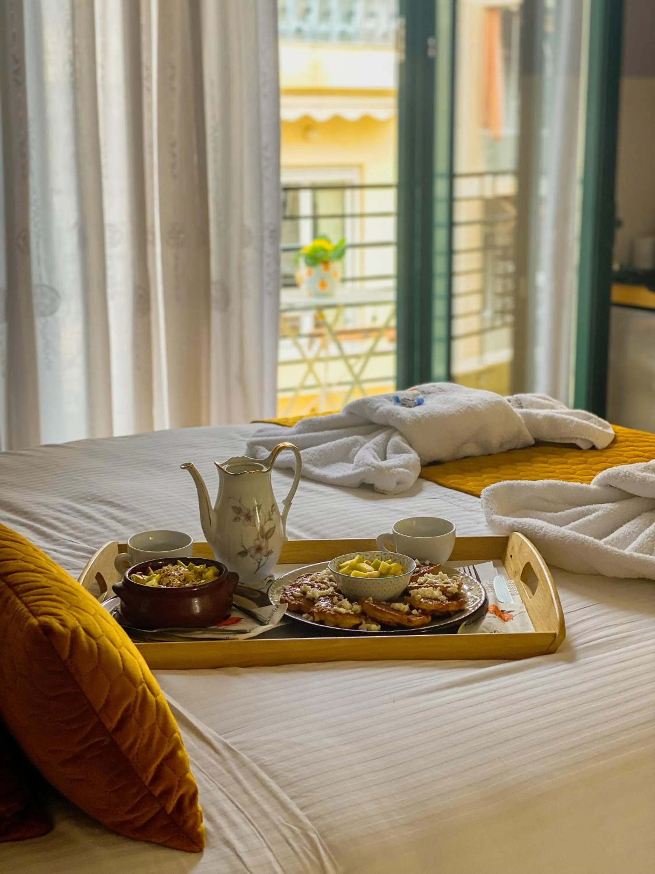 Bed in Neratzia Rooms