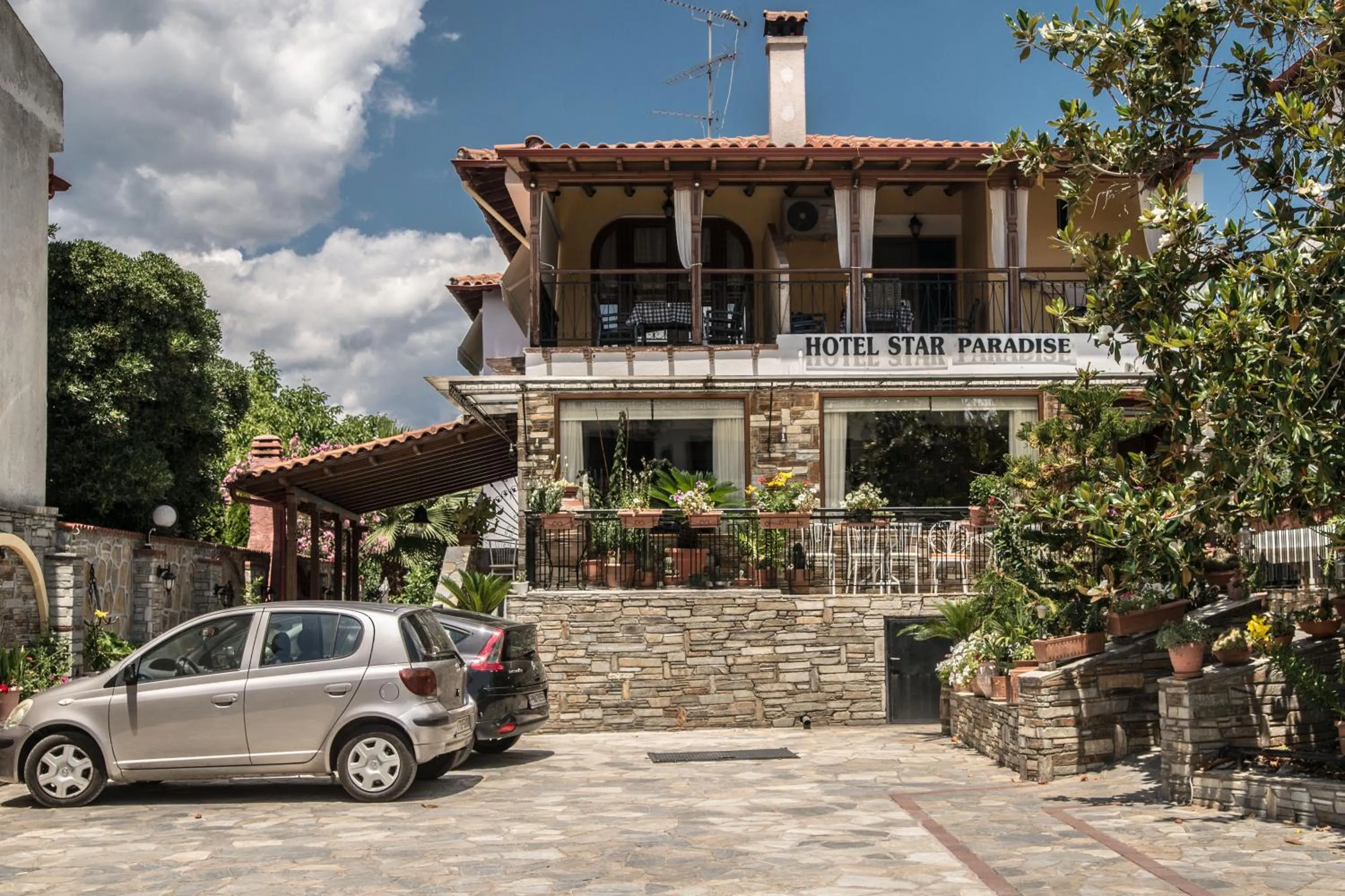 Property logo or sign in Star Paradise Hotel