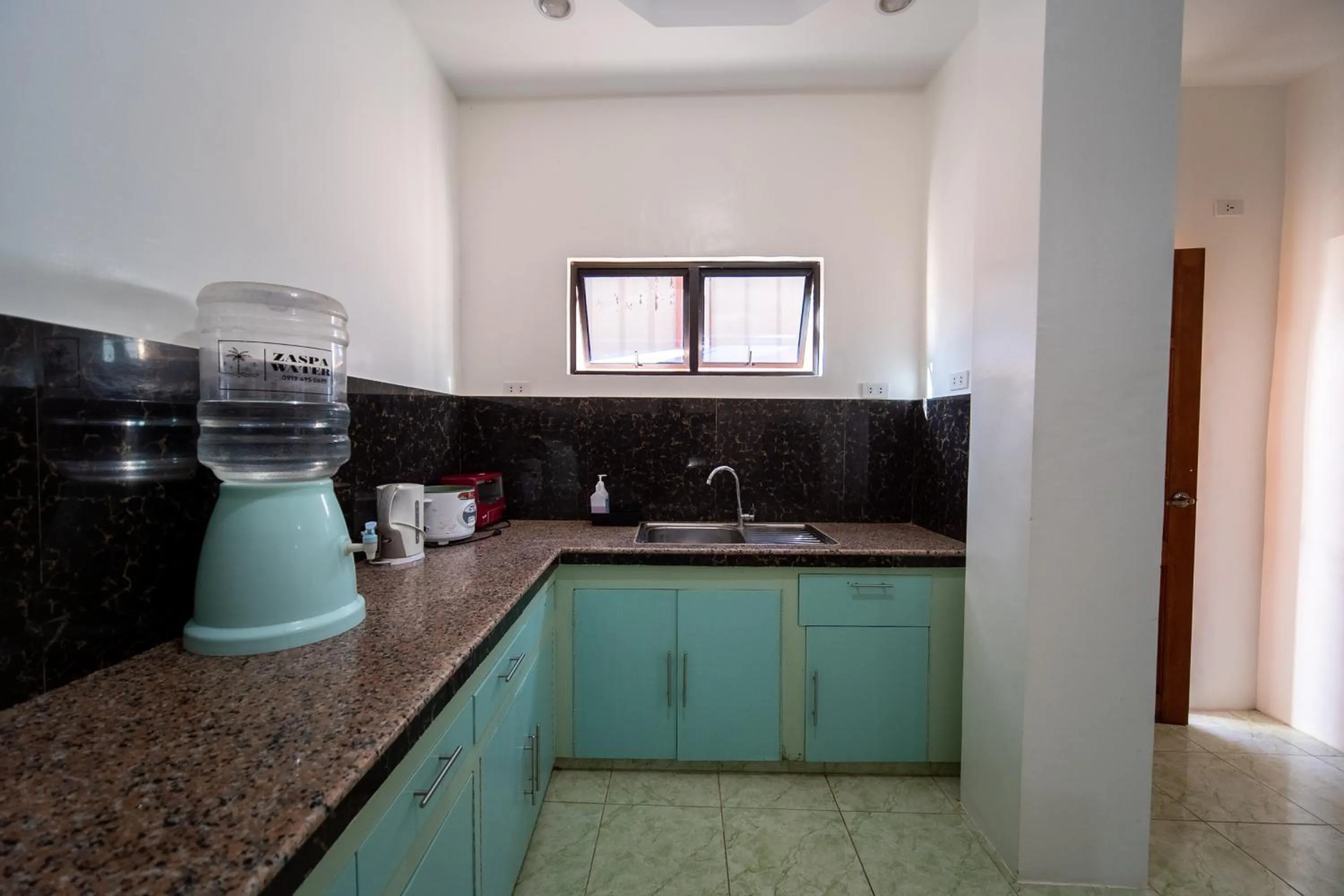 Kitchen or kitchenette in SMAK's Hotel