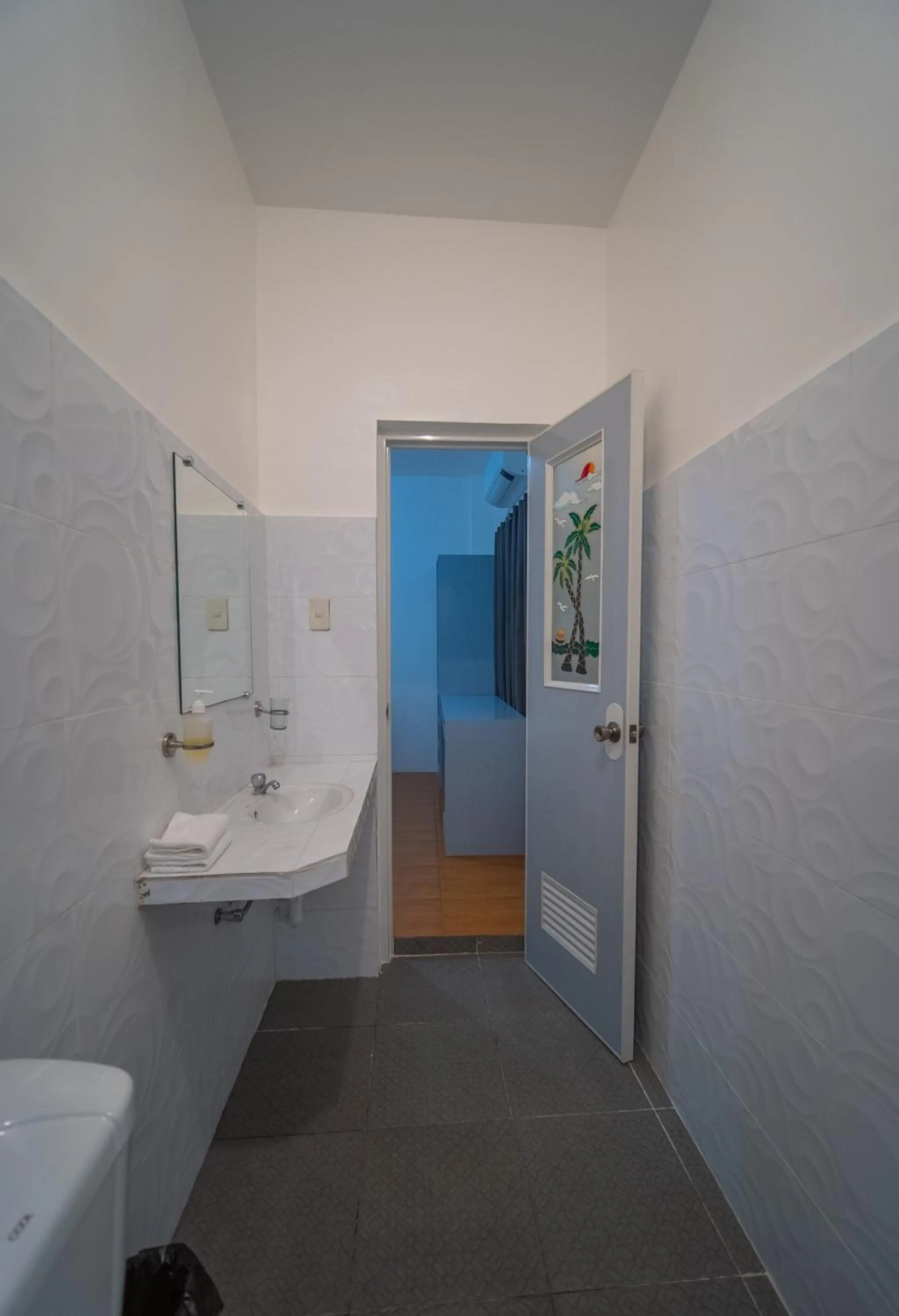 Toilet in SMAK's Hotel