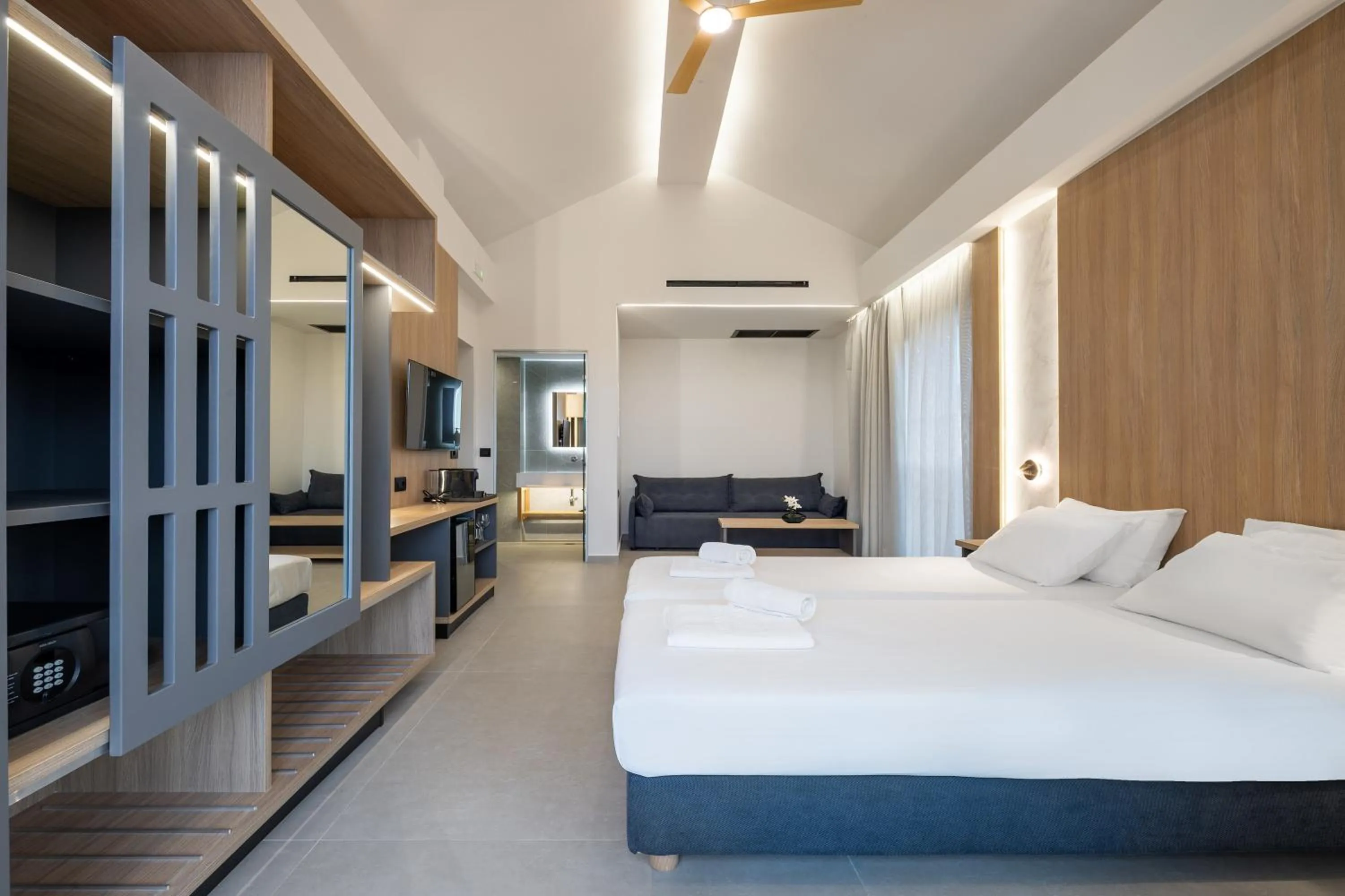 Bed in Oscar Suites & Village