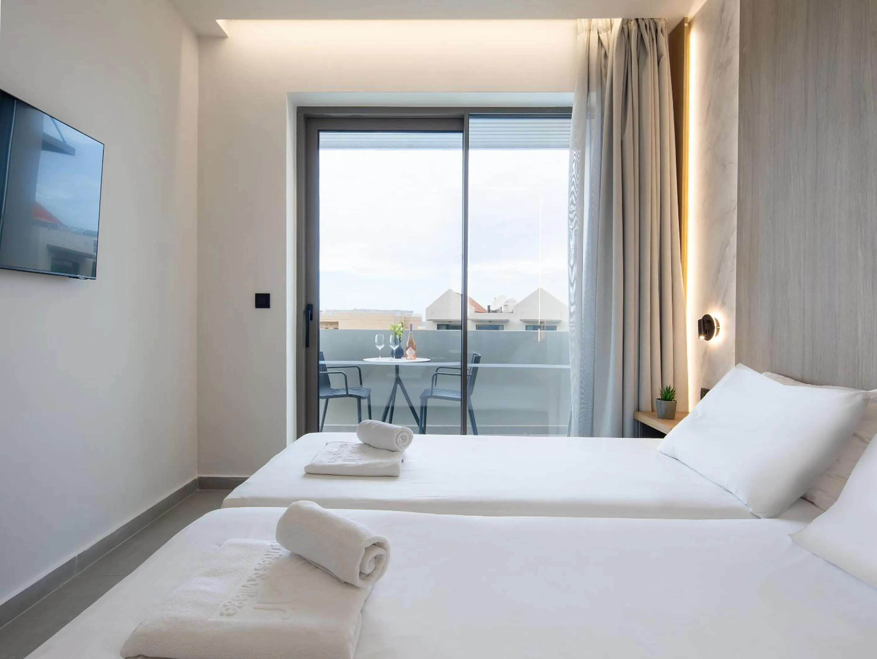 Bed in Oscar Suites & Village