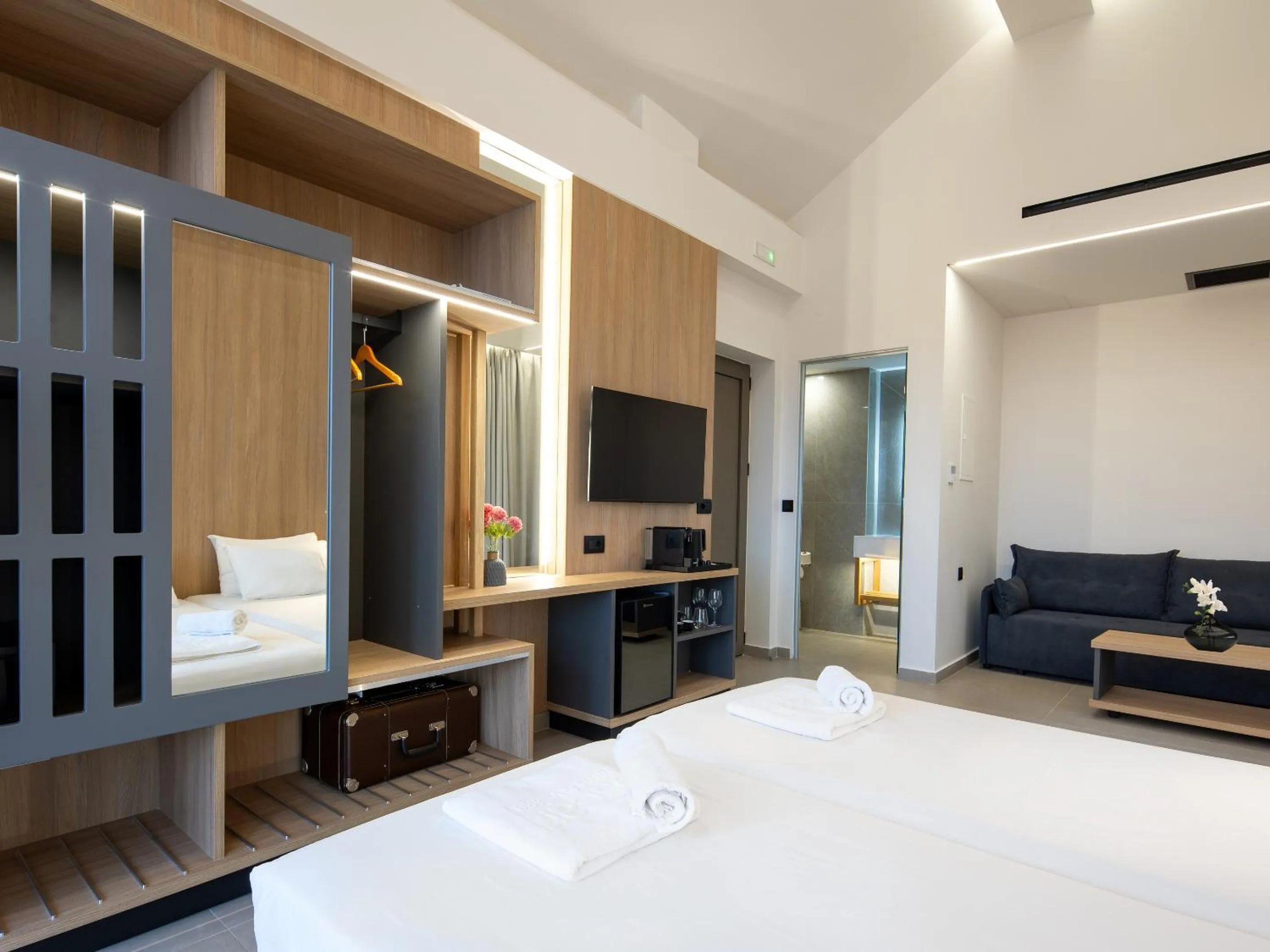 Bed in Oscar Suites & Village