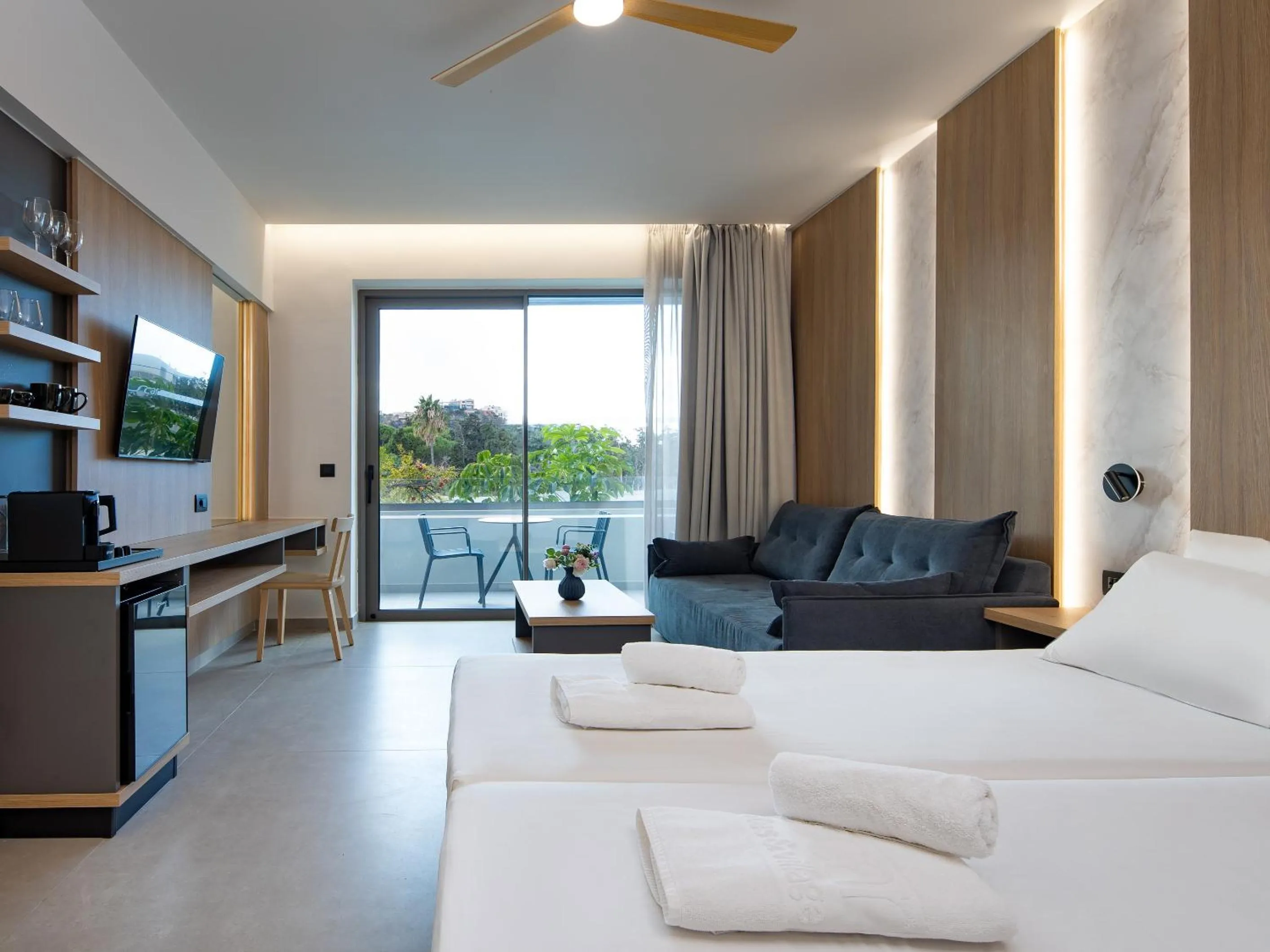 Bed in Oscar Suites & Village