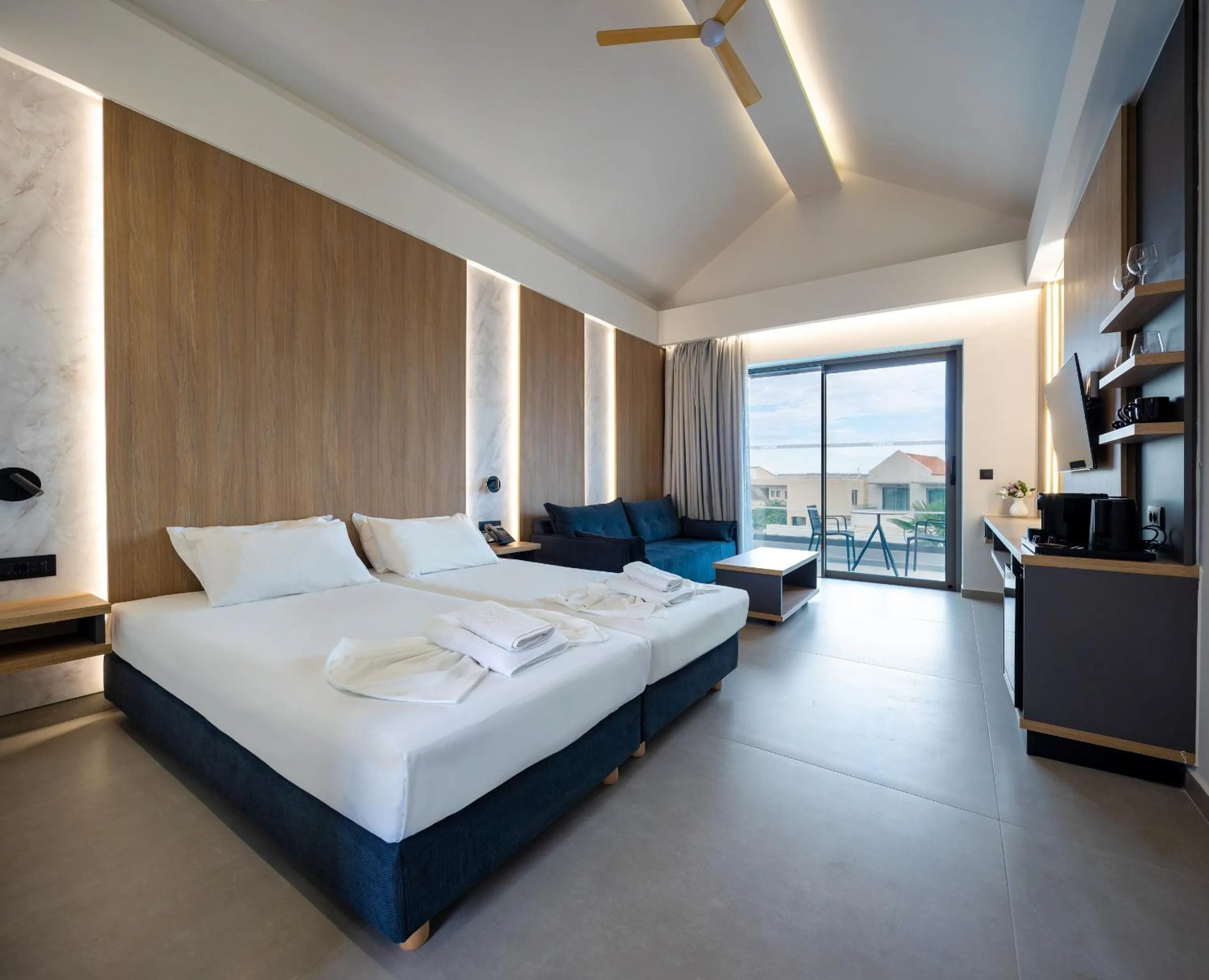 Bed in Oscar Suites & Village