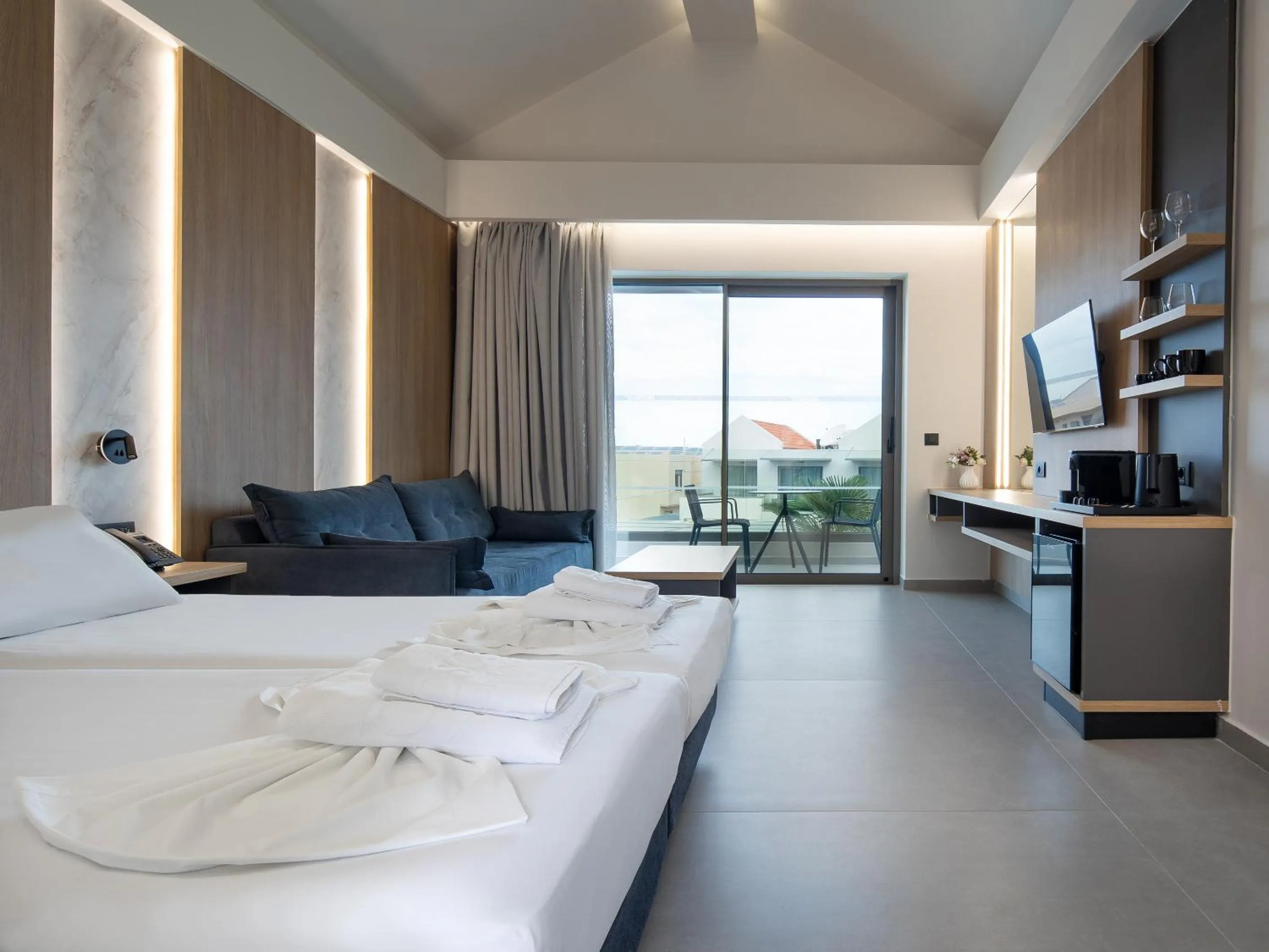 Bed in Oscar Suites & Village