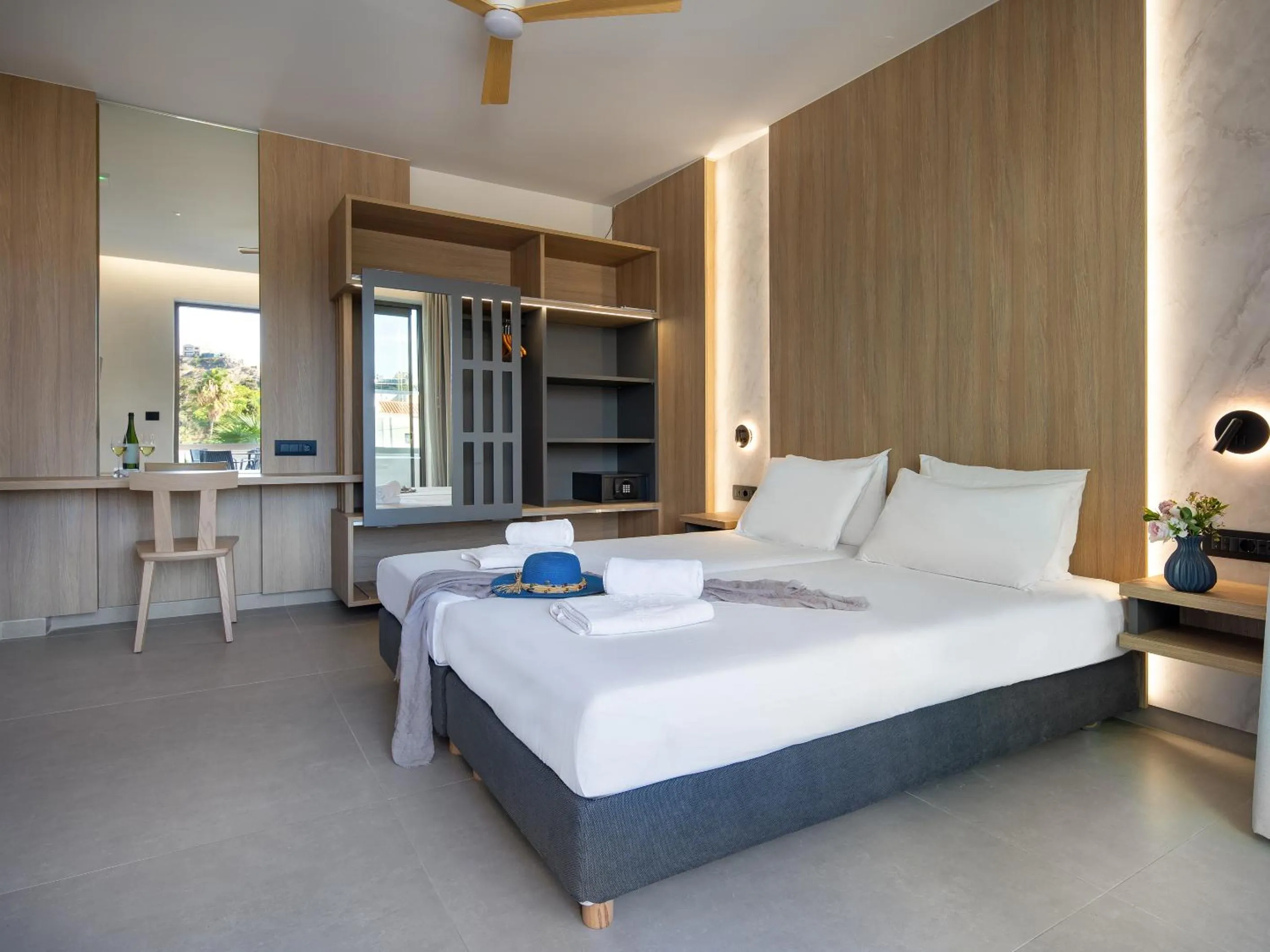 Bed in Oscar Suites & Village