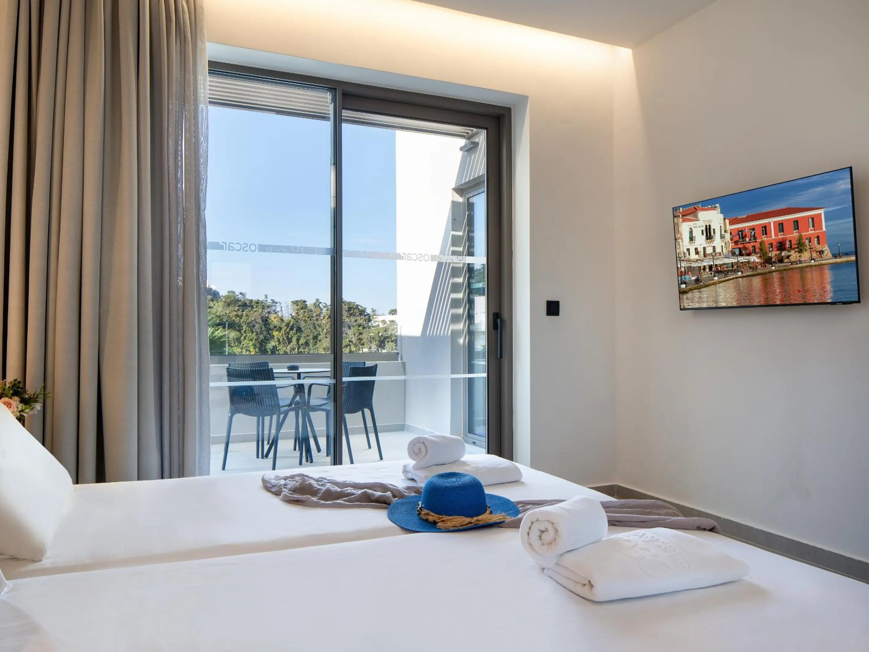 Bed in Oscar Suites & Village