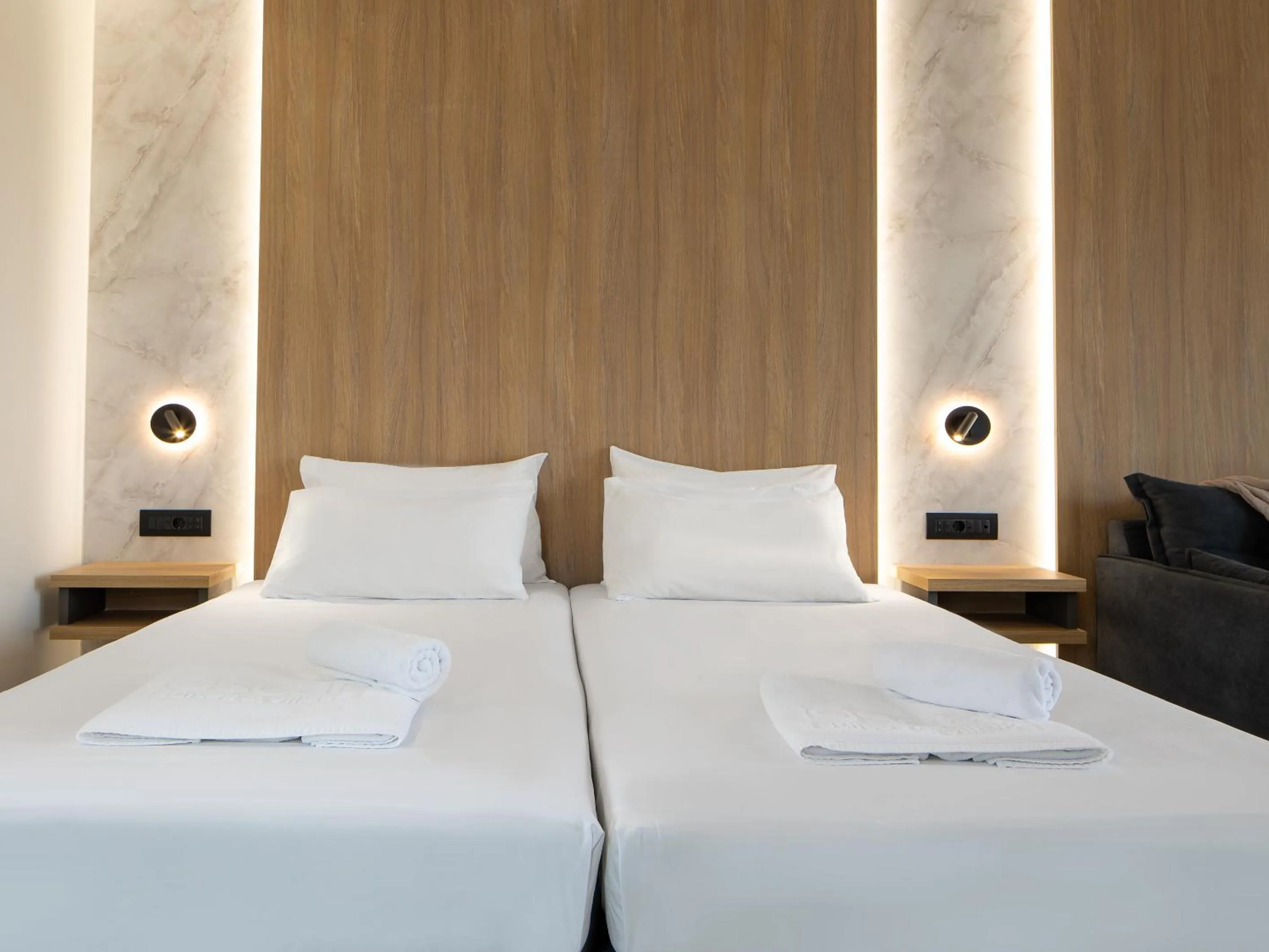 Bed in Oscar Suites & Village