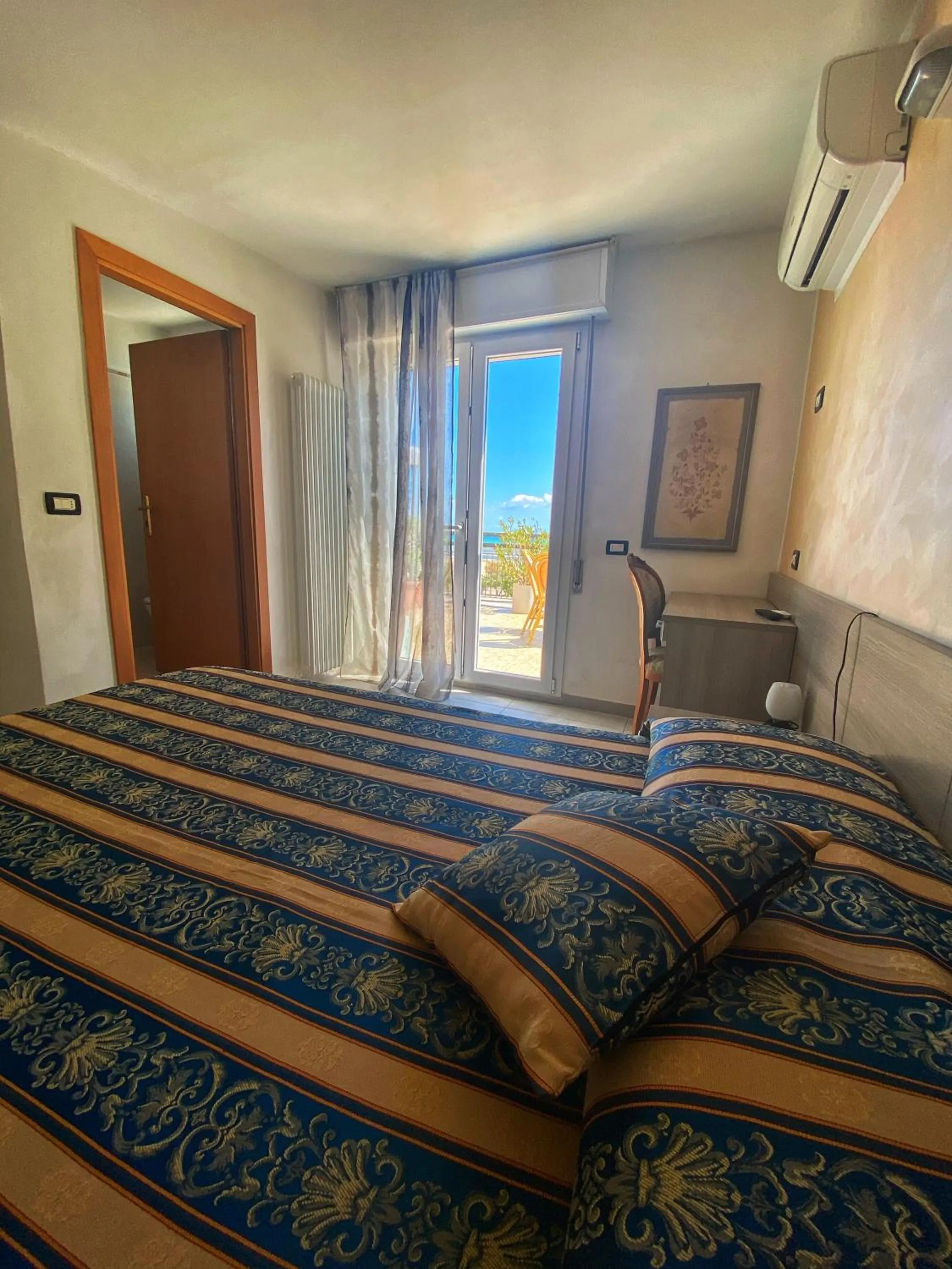 Bedroom, Bed in Hotel Amoha