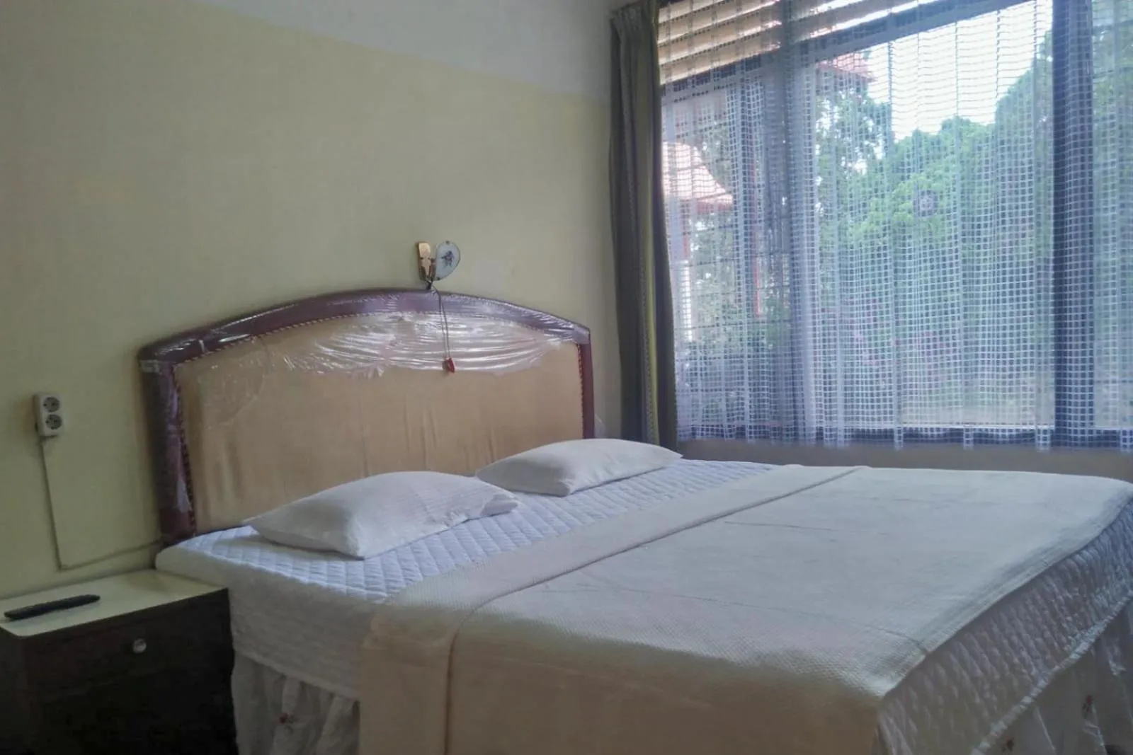Bed in Hotel Olibert Parapat Ajibata Mitra RedDoorz