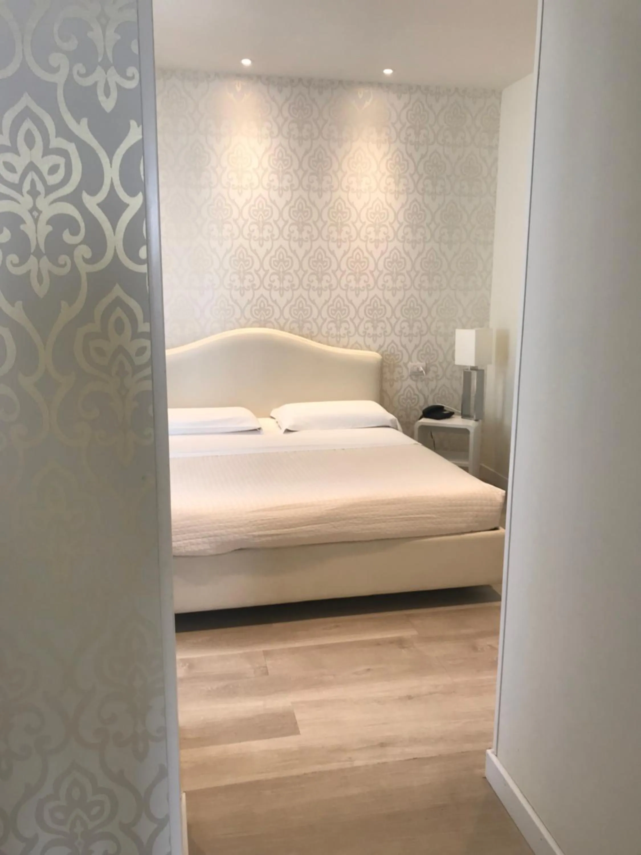 Bed in Hotel Aristeo