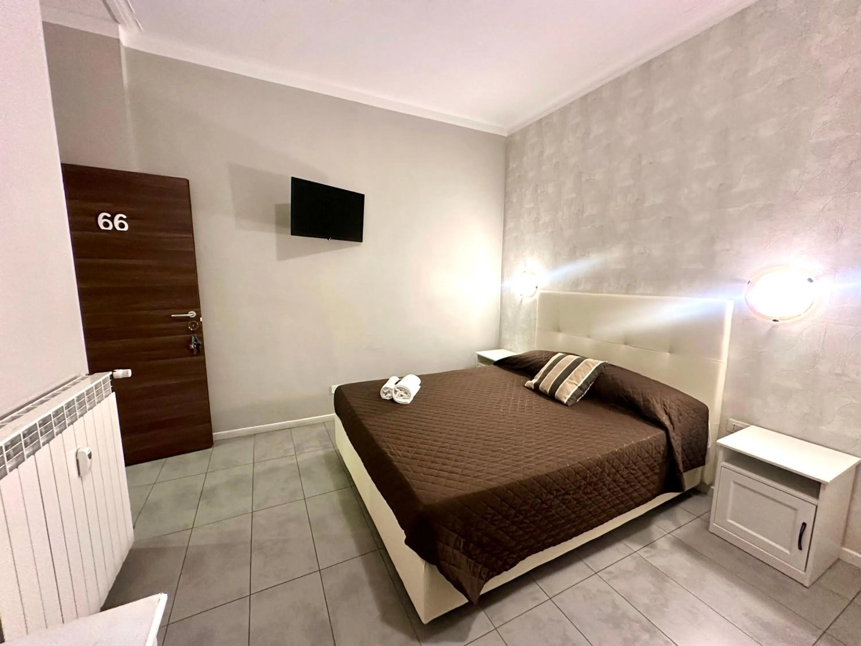 Bed in Golden Milano Hotel