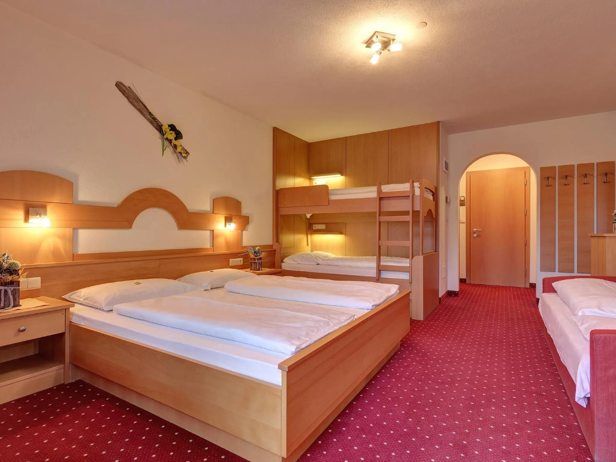 Photo of the whole room, Bed in Hotel Gisserhof - Dolomea Hotel