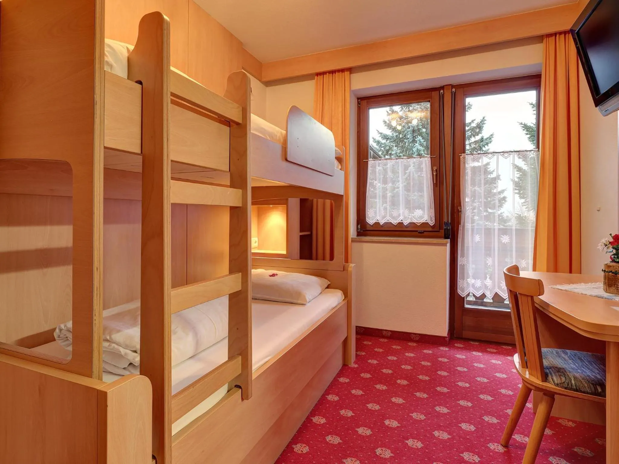 Photo of the whole room, Bed in Hotel Gisserhof - Dolomea Hotel