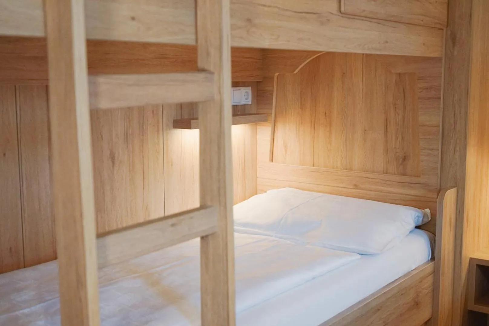 Bed in Hotel Gisserhof - Dolomea Hotel